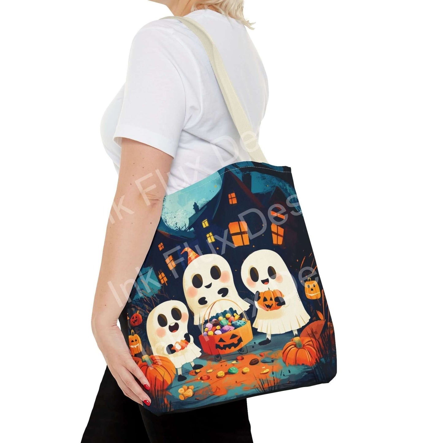 Woman carrying a Little Ghost Tote Bag with all-over print featuring cute ghosts, pumpkins, and a haunted house, made from durable polyester.