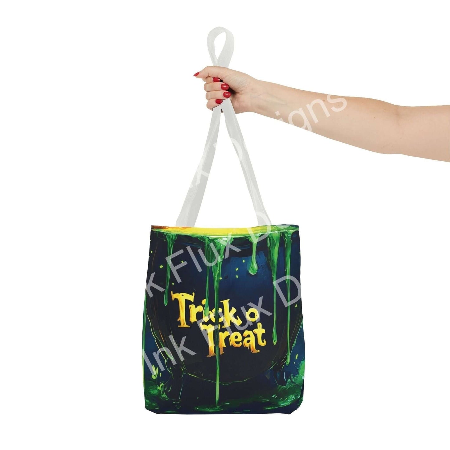 Hand holding a witch cauldron-themed tote bag, styled with vibrant all-over print and sturdy white handles for Halloween.