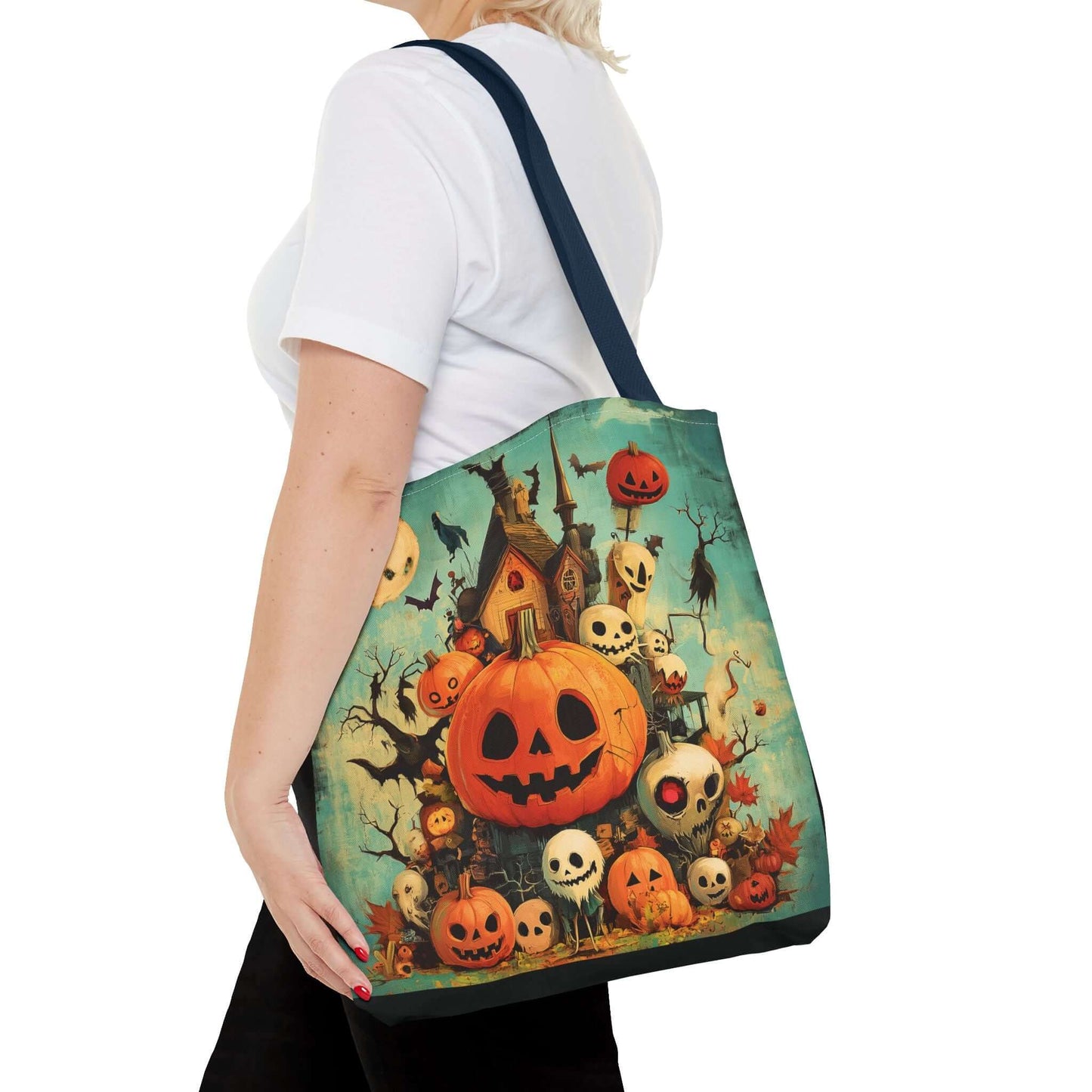 Woman carrying a Jack o' Lanterns design tote bag with durable blue strap, featuring all-over spooky Halloween print on high-quality polyester.
