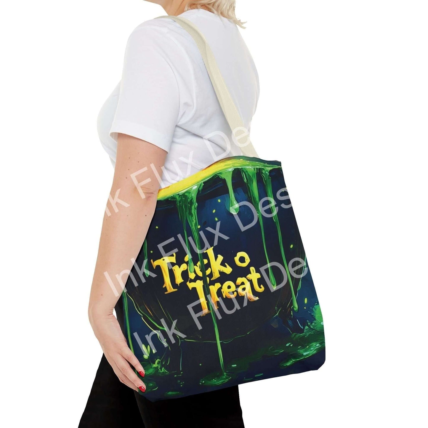 Woman carrying a witch cauldron all-over print tote bag with 'Trick or Treat' design, available in multiple handle colors and sizes, featuring durable materials.