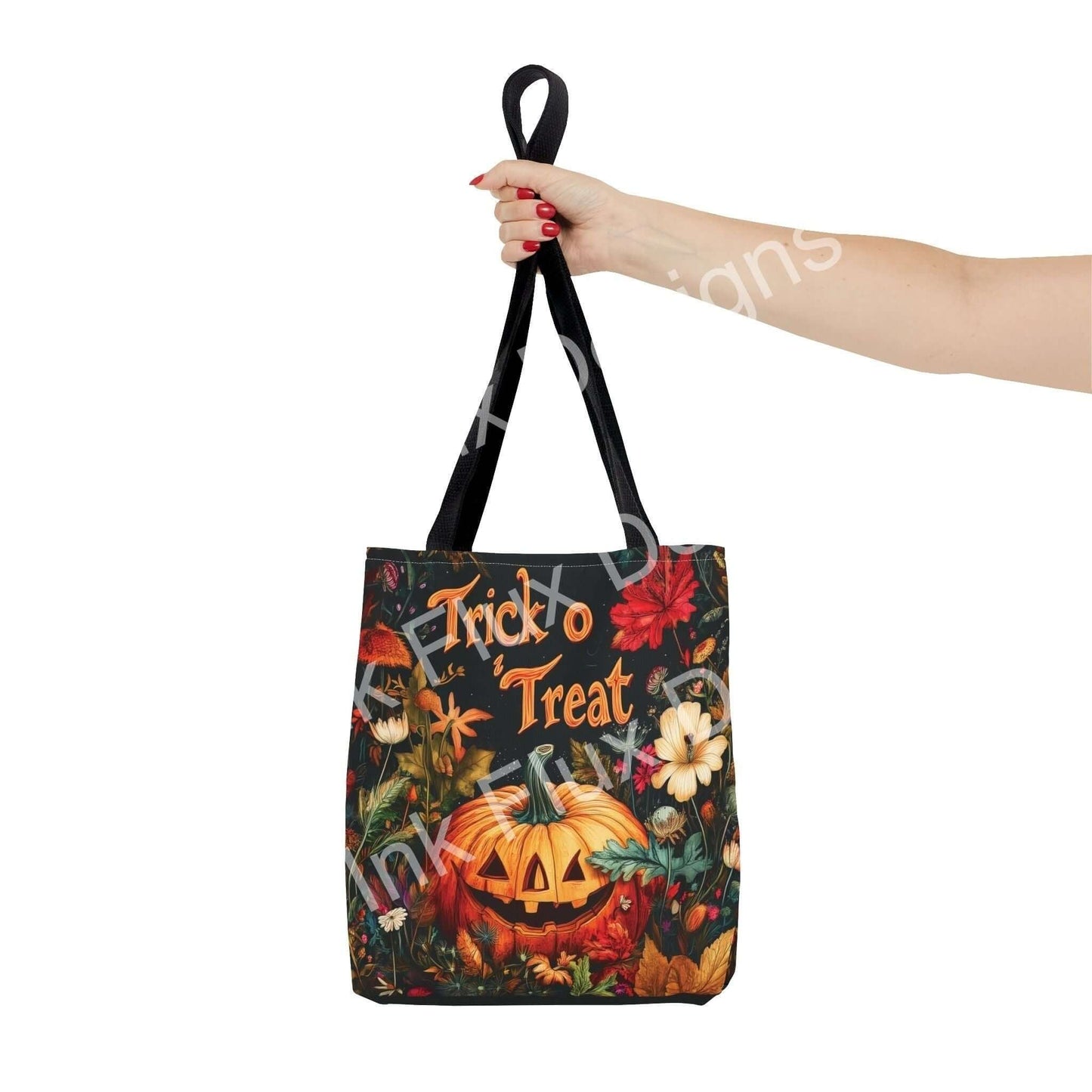 Hand holding a Jack o Lantern themed tote bag with "Trick to Treat" design, featuring vibrant all-over print on a durable polyester material.