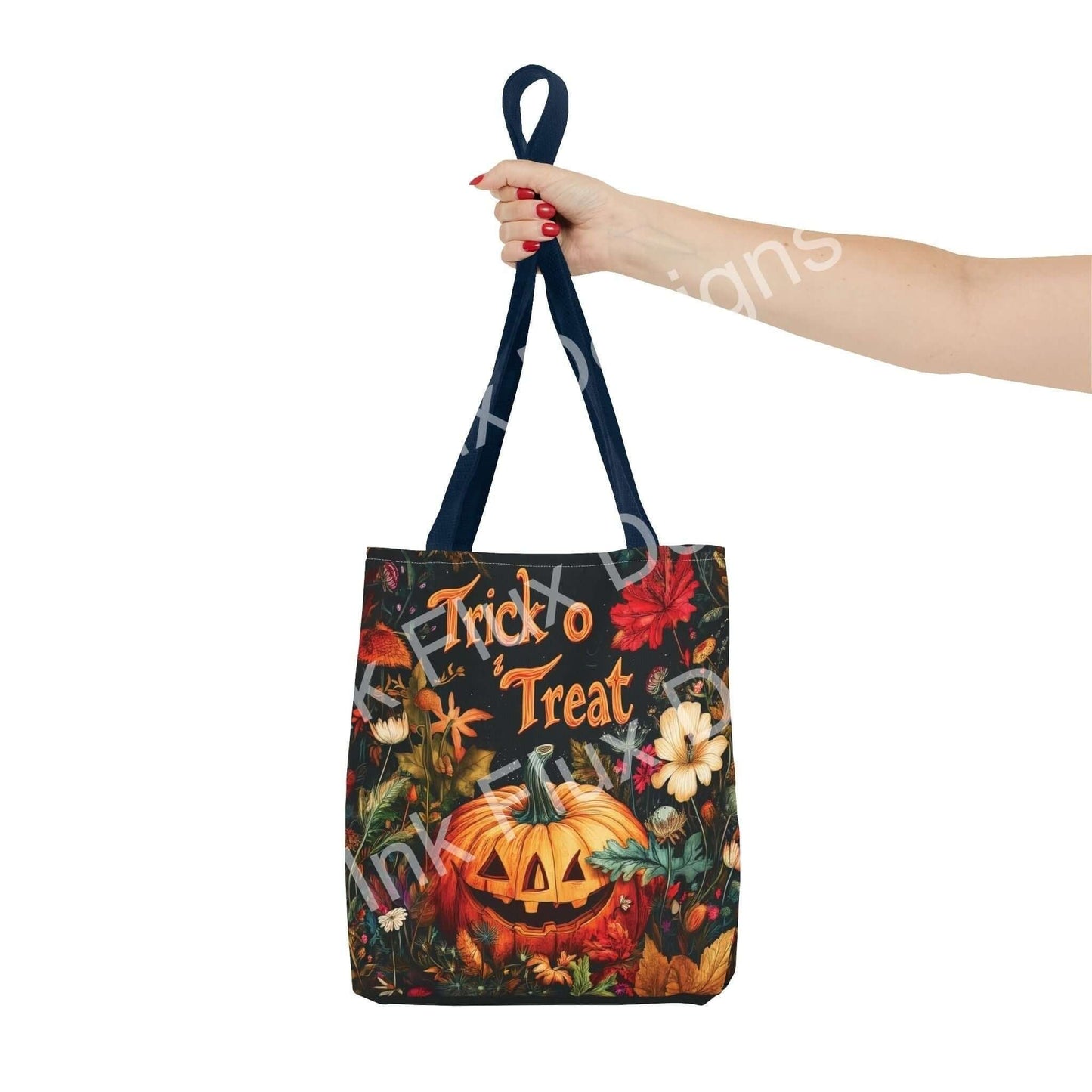 Woman holding a Jack o Lantern Tote Bag with "Trick to Treat" design, featuring vibrant autumn leaves and pumpkin, perfect for Halloween.