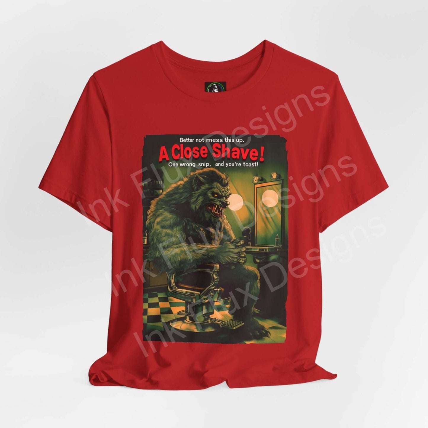 Red unisex jersey T-shirt featuring a Halloween graphic of a werewolf having a shave with text "A Close Shave!" on the front.