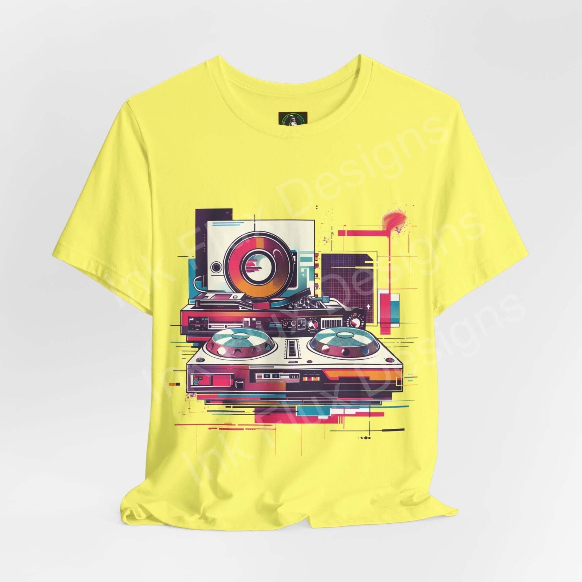 Yellow unisex T-shirt featuring bold graphic of DJ gear with abstract design, made from breathable Airlume cotton, by Bella+Canvas.
