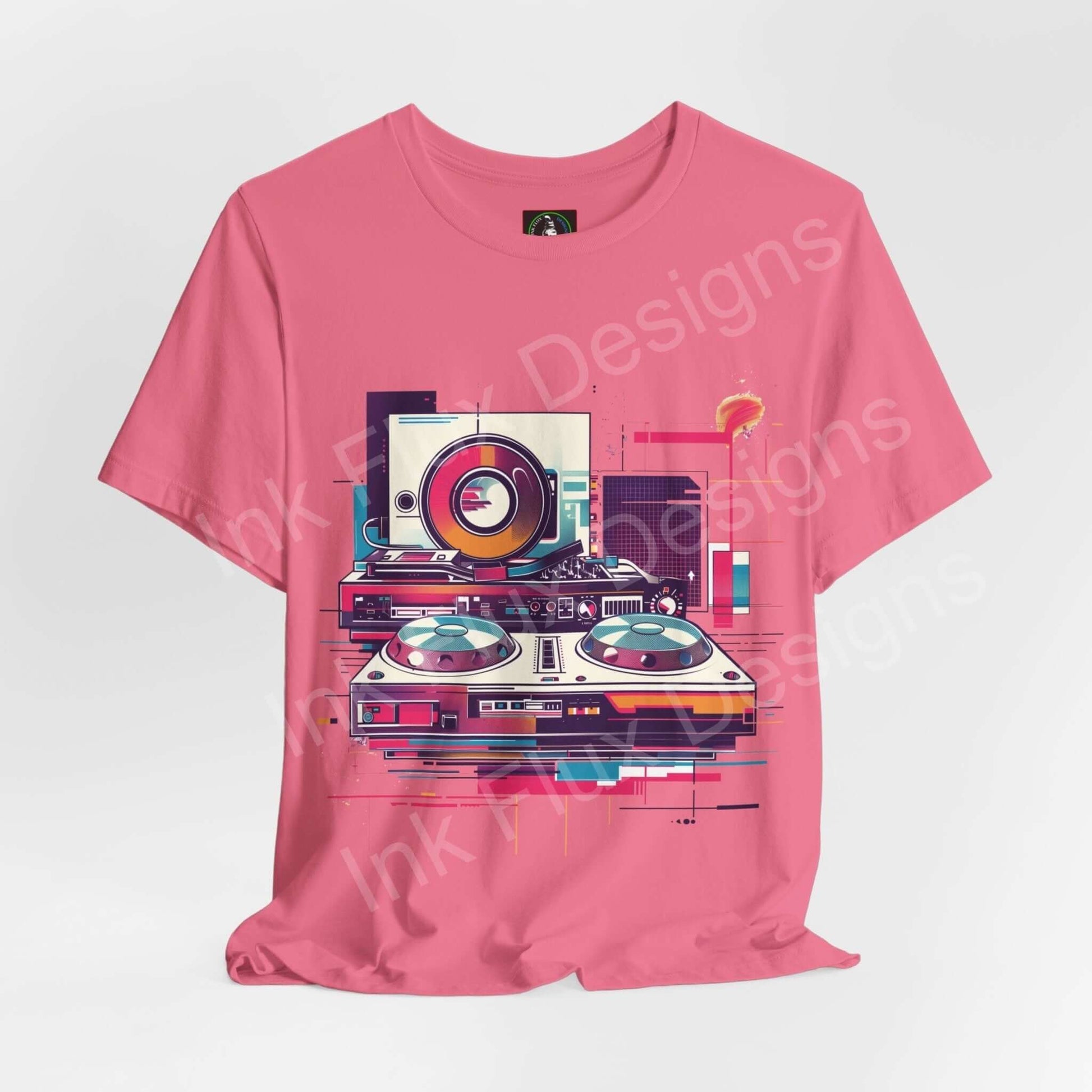 Pink unisex jersey T-shirt featuring bold graphic of abstract DJ gear with turntables and vibrant colors, ideal for music lovers.