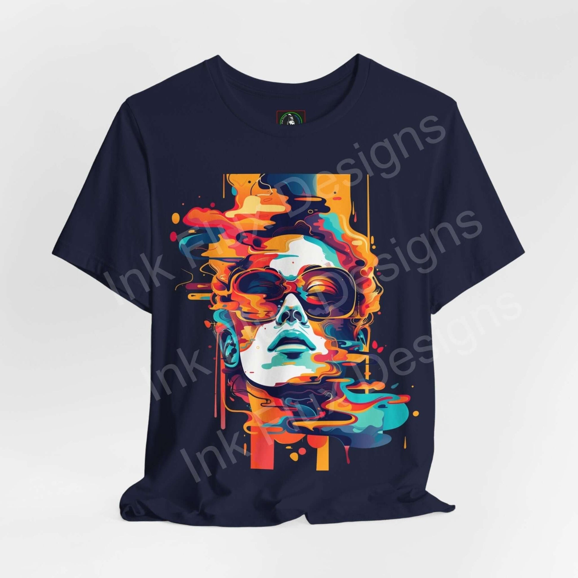 Abstract cyberpunk graphic tee featuring vivid, splattered portrait design on a dark blue Bella+Canvas T-shirt, ideal for style and comfort.