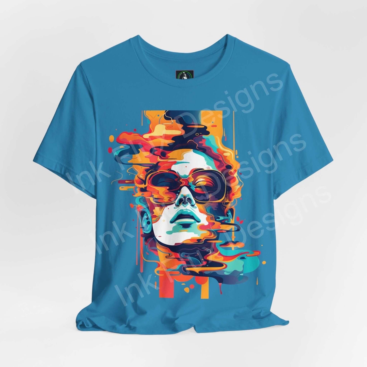 Cyberpunk-inspired blue T-shirt with vibrant abstract portrait design, featuring graphic tees style with artistic flair and bold colors.