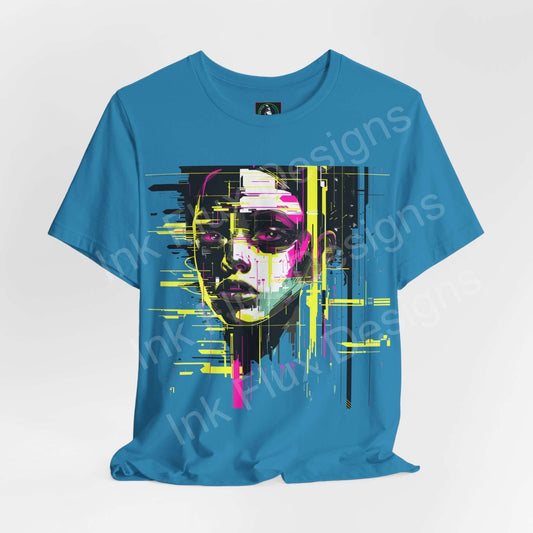 Cyberpunk-themed graphic tee featuring an abstract portrait design in vibrant yellow and pink on a blue shirt, from Bella+Canvas.