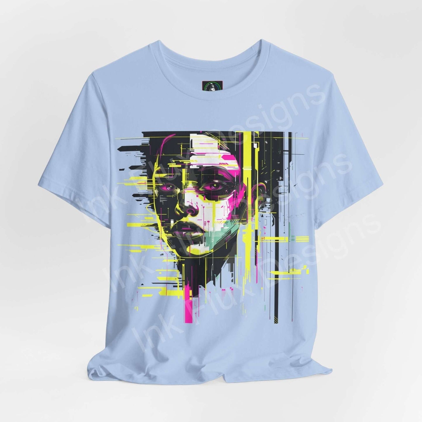 Light blue unisex T-shirt featuring a vibrant, abstract cyberpunk portrait in pink, yellow, and black, from Bella+Canvas Graphic Tees collection.