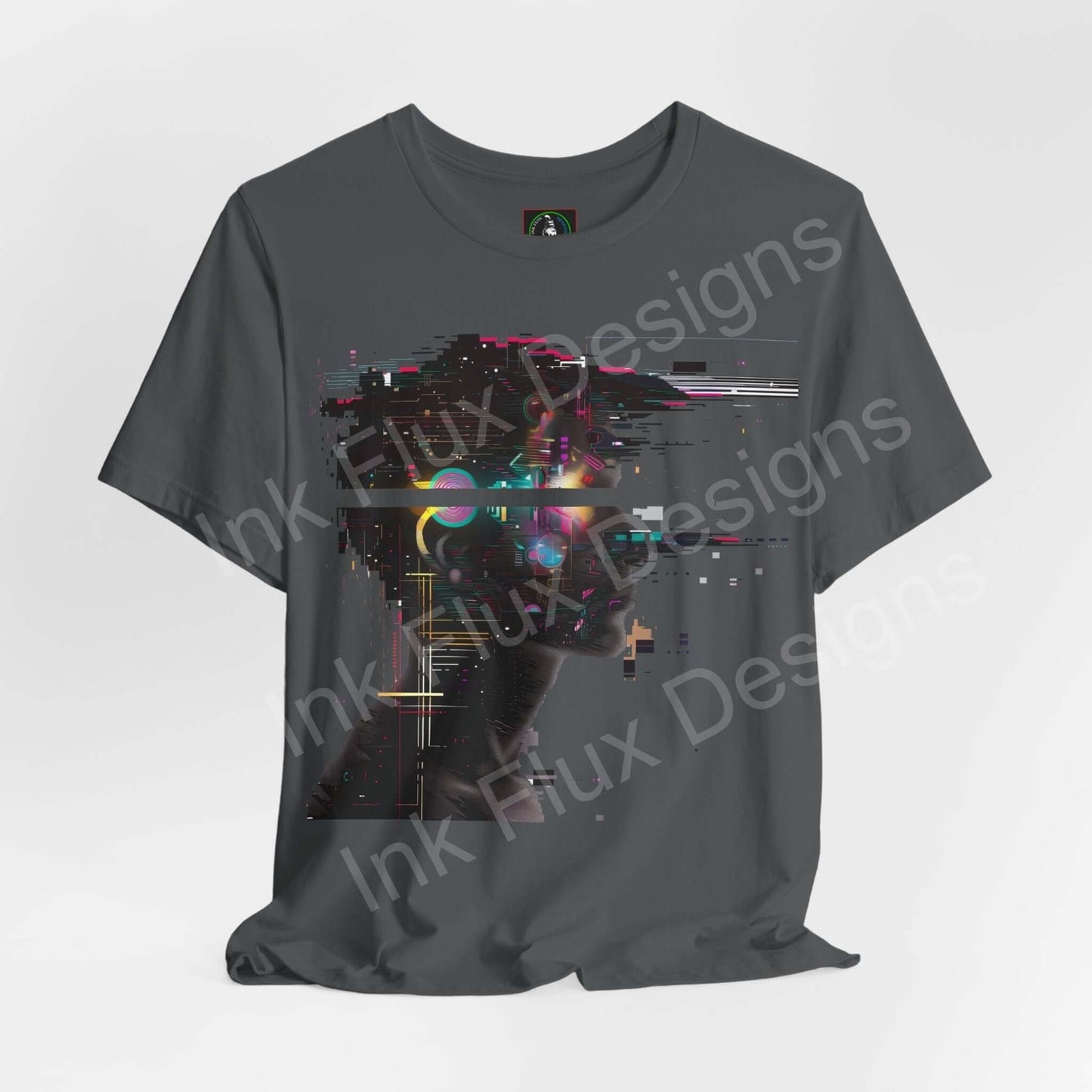 Cyberpunk-inspired graphic tee featuring an abstract portrait with vibrant digital elements on a dark gray unisex T-shirt by Bella+Canvas.