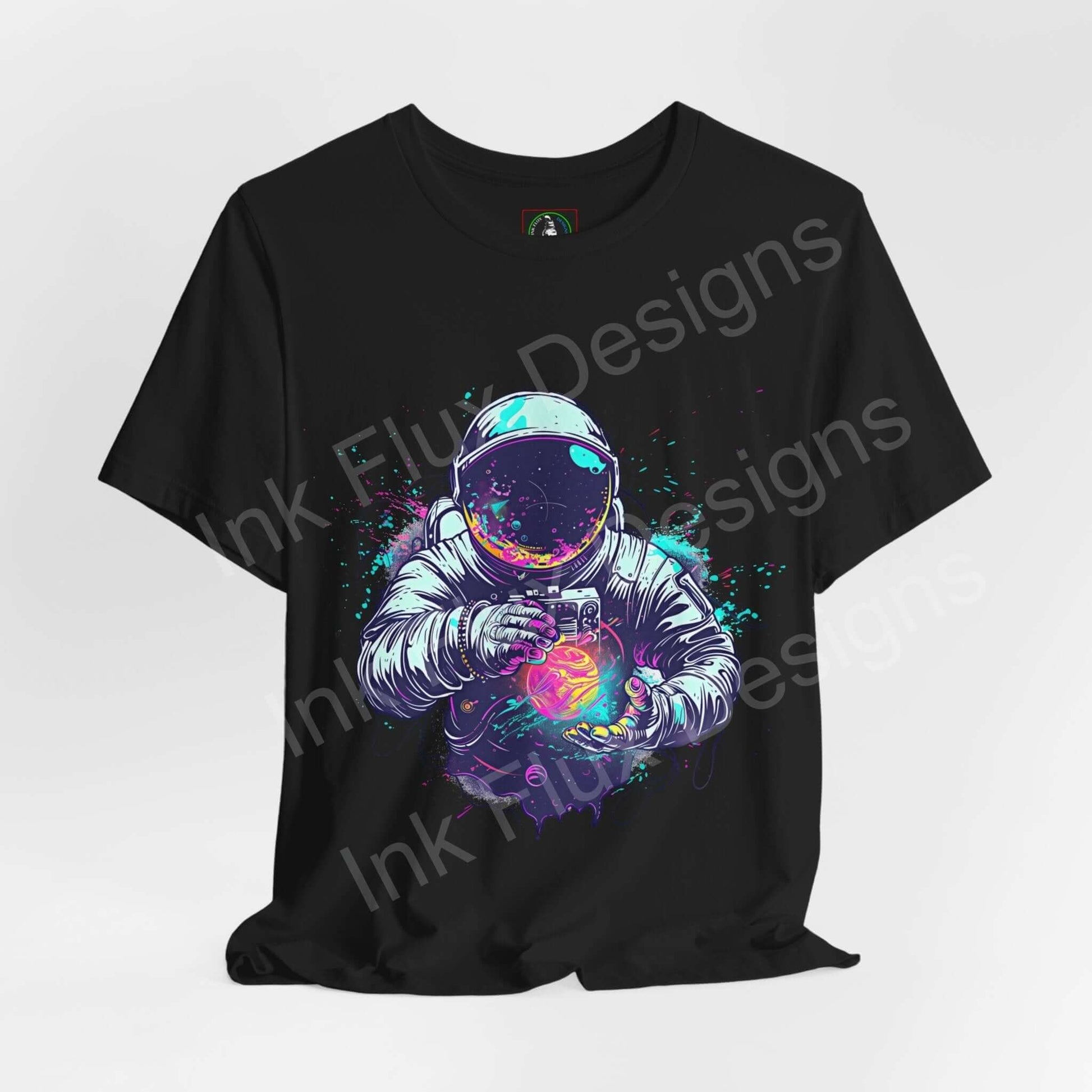 Black unisex T-shirt with vibrant graphic of astronaut holding a glowing orb, featuring bold colors and detailed design, ideal for style and comfort.