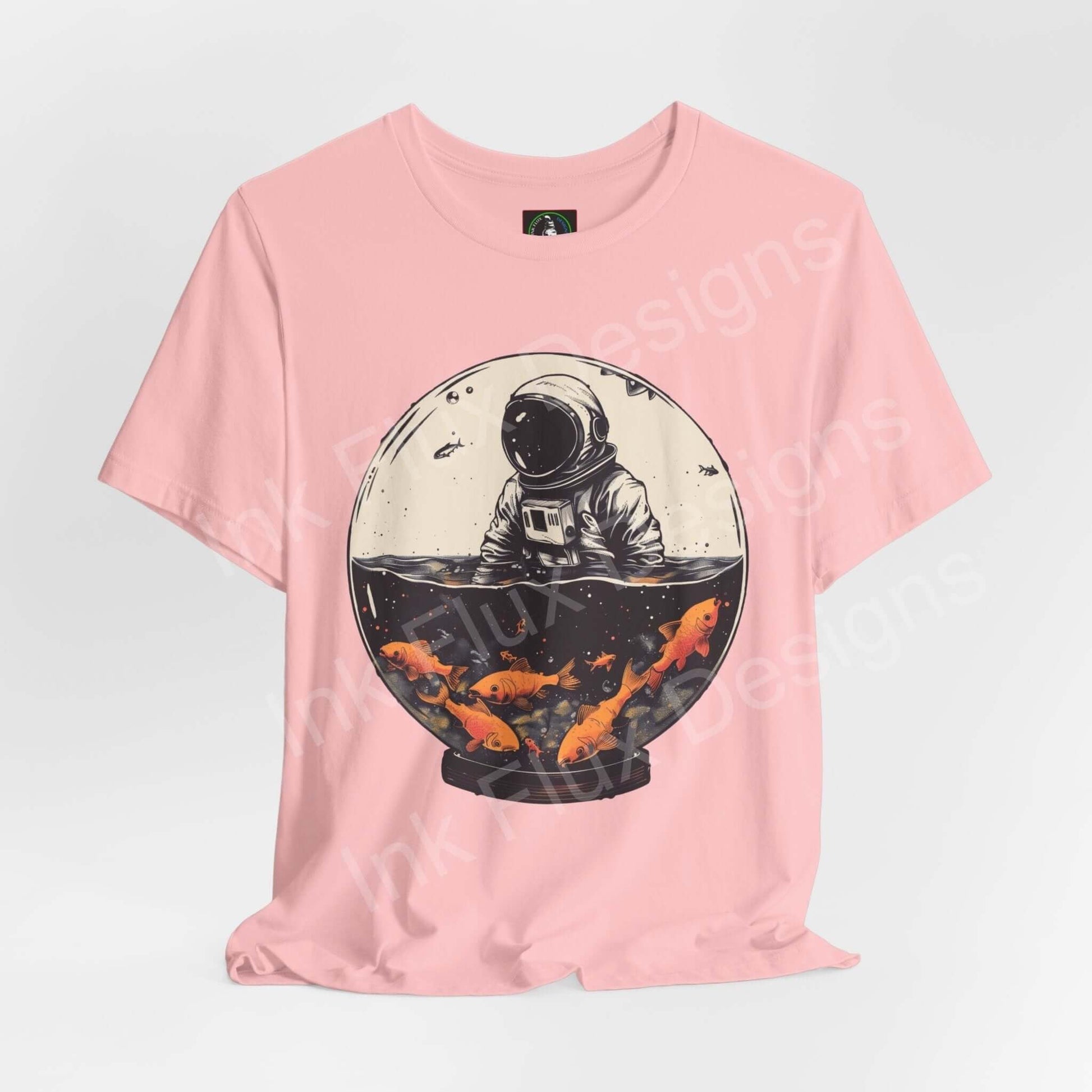 Astronaut Fish Globe graphic tee in pink, featuring a bold design of an astronaut with koi fish, perfect for style and comfort.