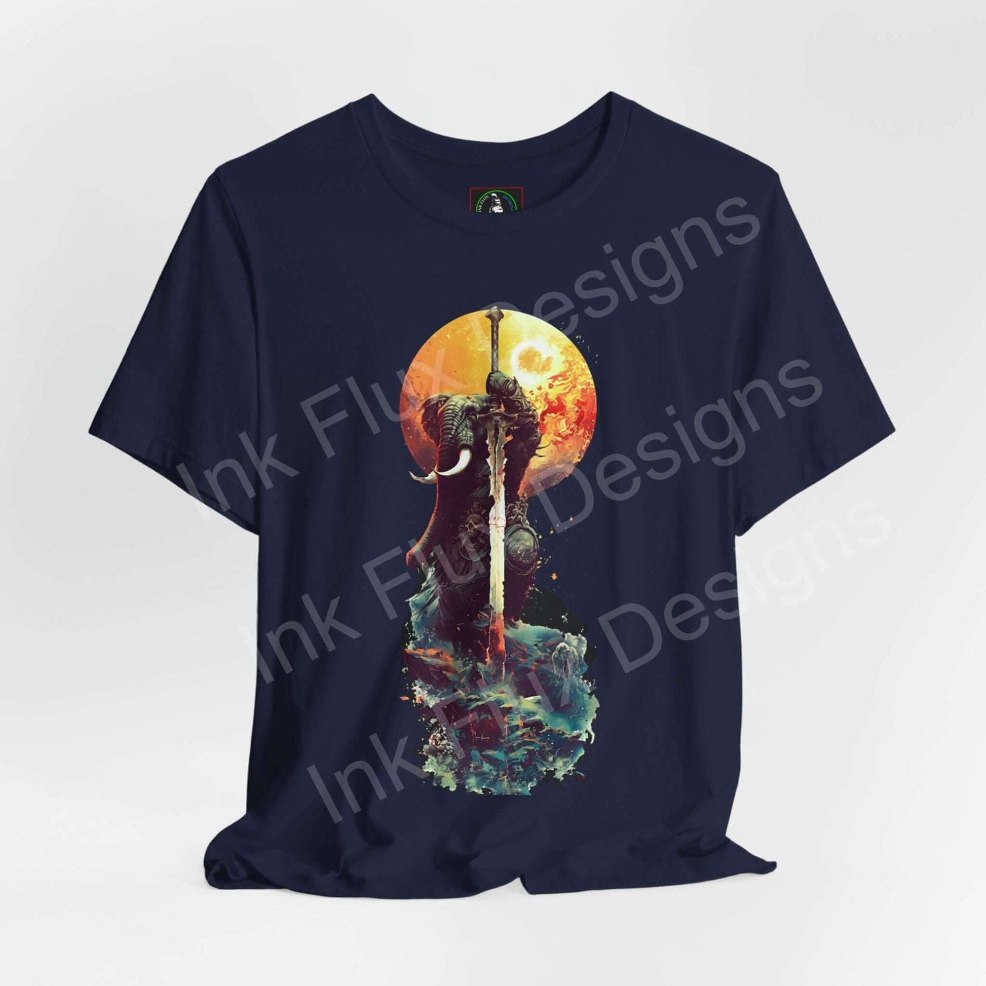 Navy blue unisex T-shirt featuring vibrant graphic of a battle-worn elephant warrior against a sunset, from Bella+Canvas, highlighting comfort and style.