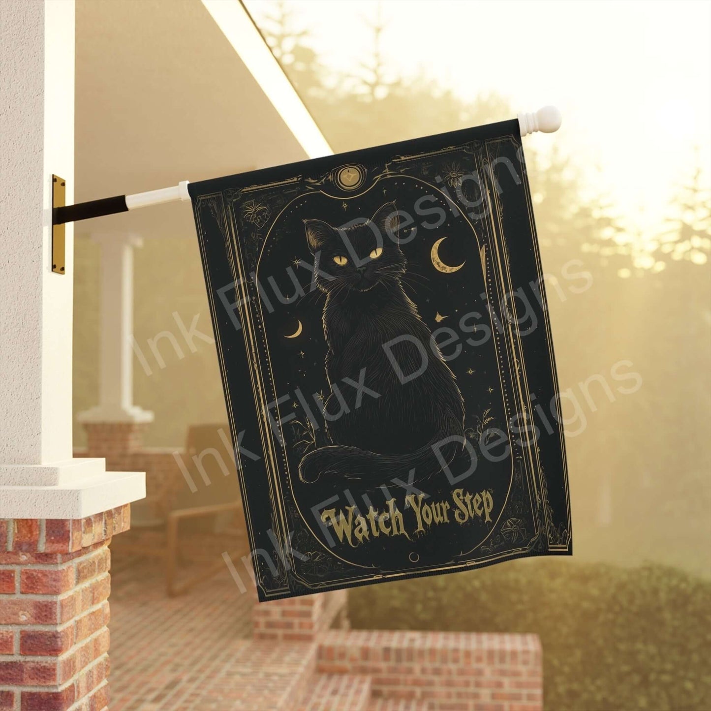 Black Cat Garden & House Banner with a mystical design, hung on a white pole, featuring a cat silhouette, moons, and stars, perfect for Halloween decor.