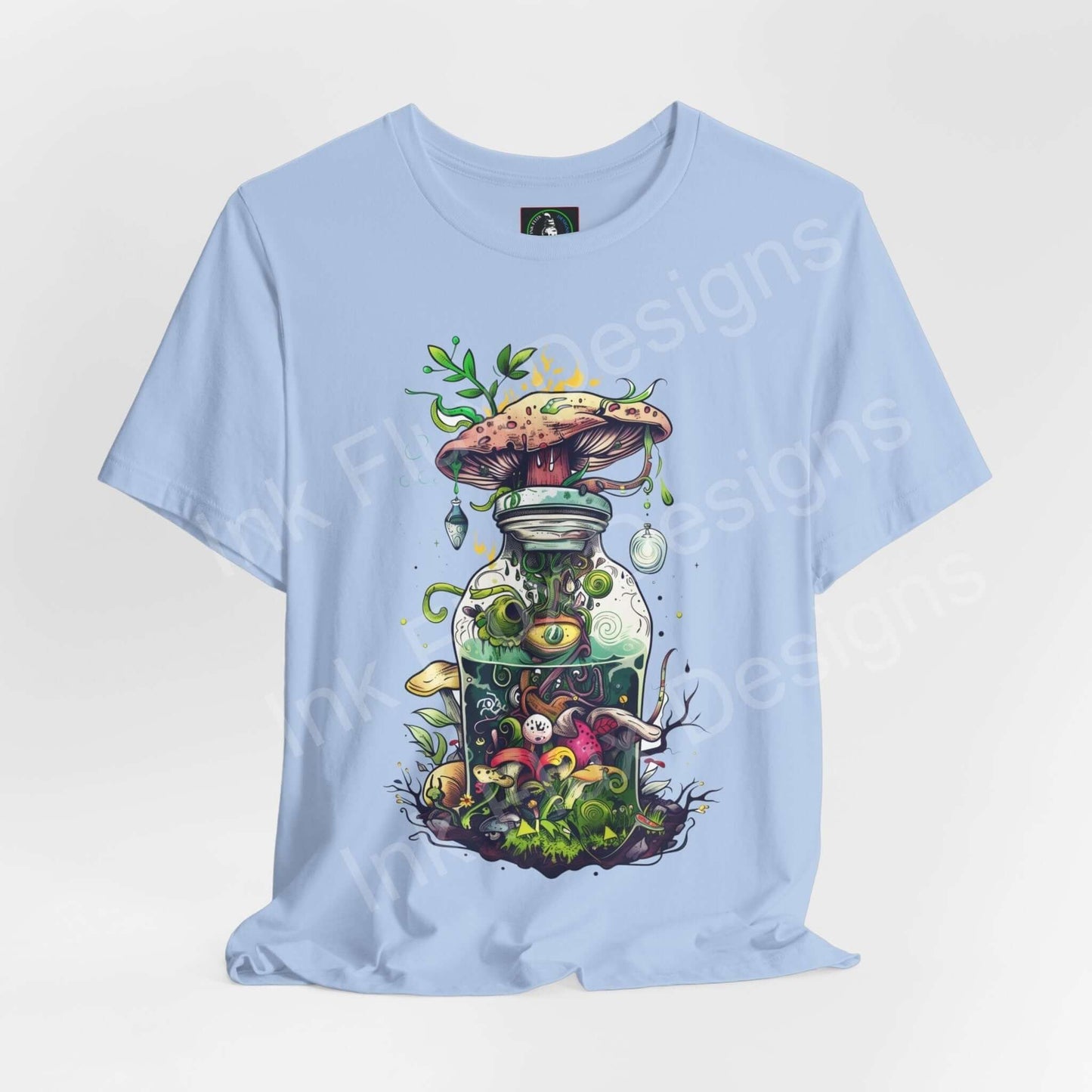 Light blue unisex T-shirt featuring a bold, trippy graphic of psychedelic mushrooms in a bottle, designed for comfort and style by Bella+Canvas.