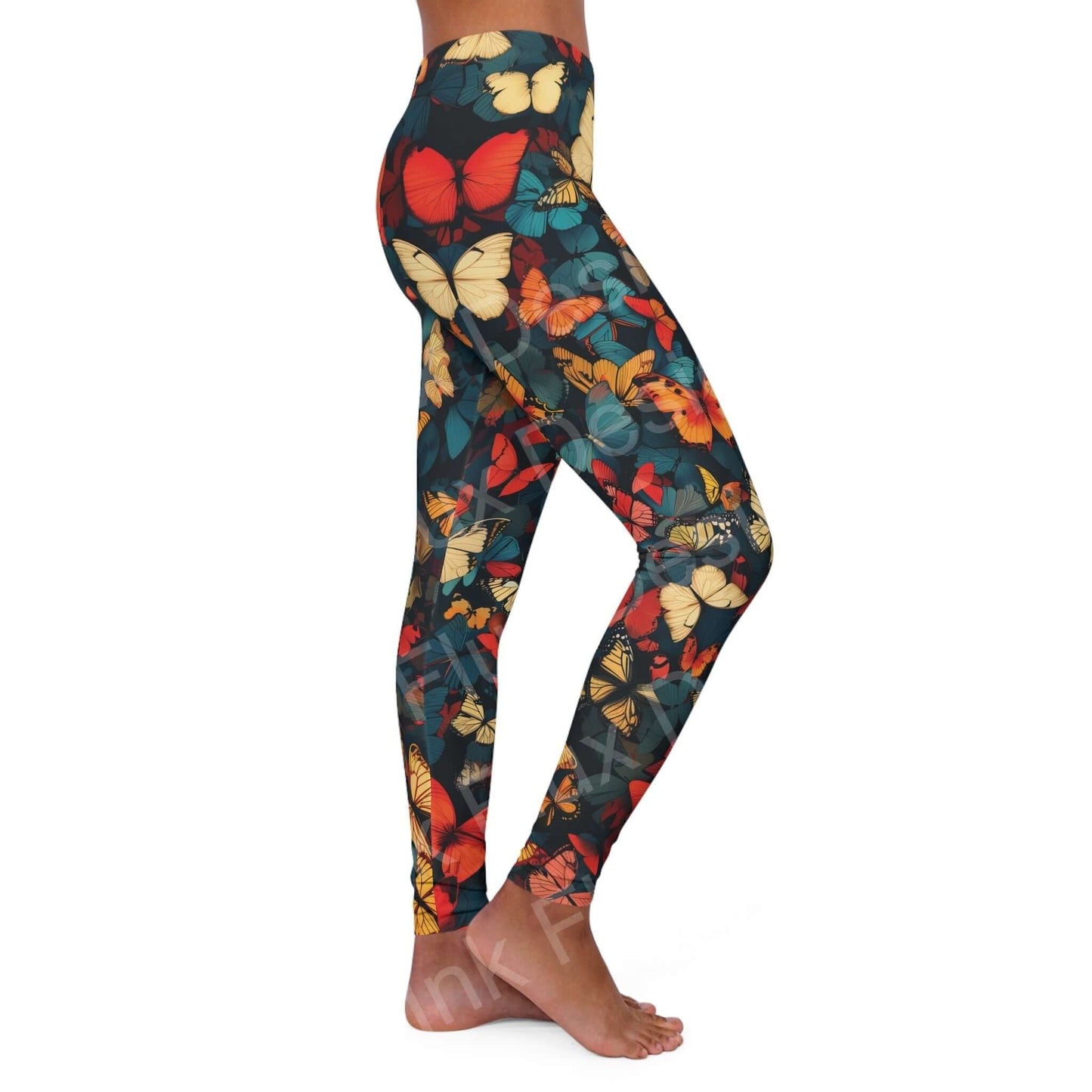 Side view of a woman wearing bold butterfly design leggings, showcasing colorful patterns on stretchy fabric.