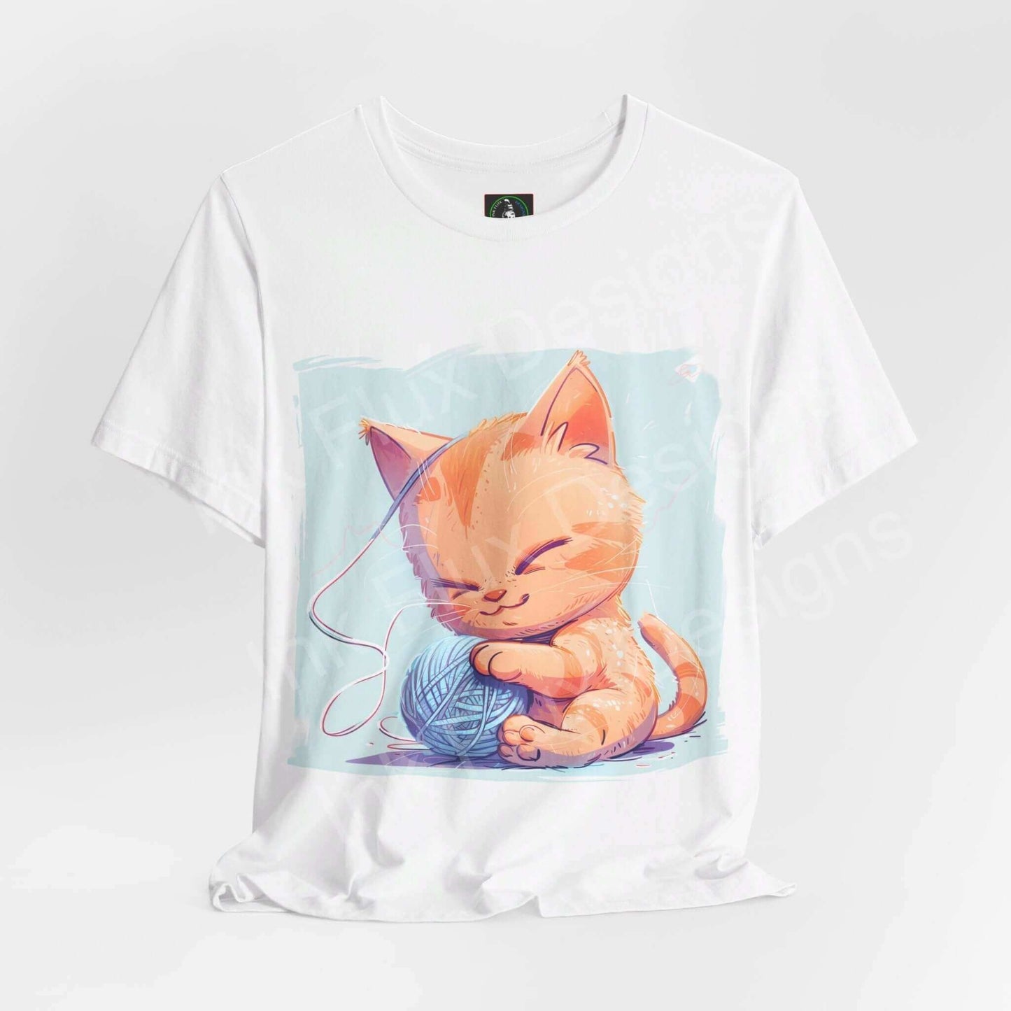 Cat T-Shirt featuring a playful kitten tangled in yarn, a perfect gift for cat lovers.