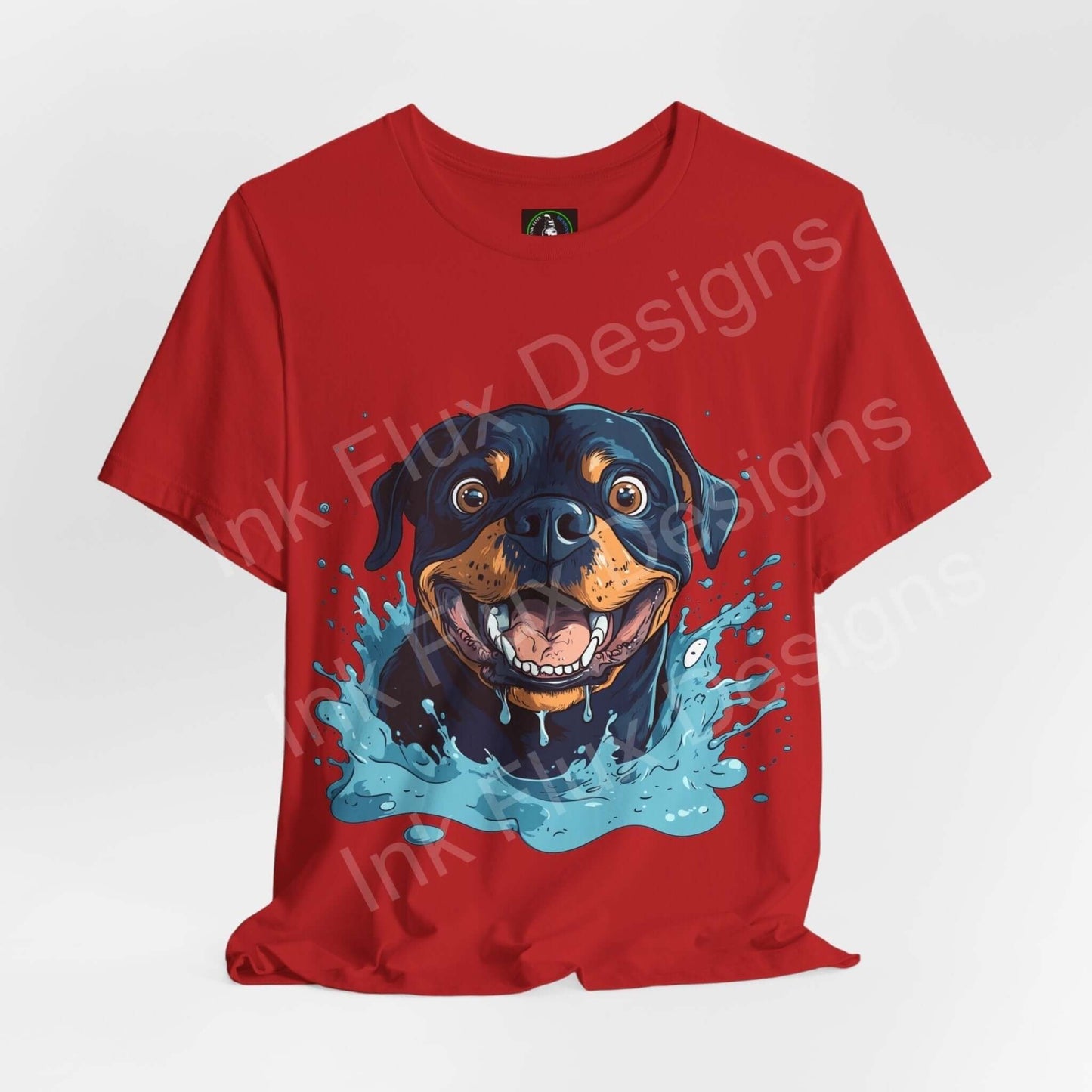 Red graphic tee featuring a vibrant Rottweiler design, crafted from sustainable Airlume cotton by Bella+Canvas, perfect for dog lovers.