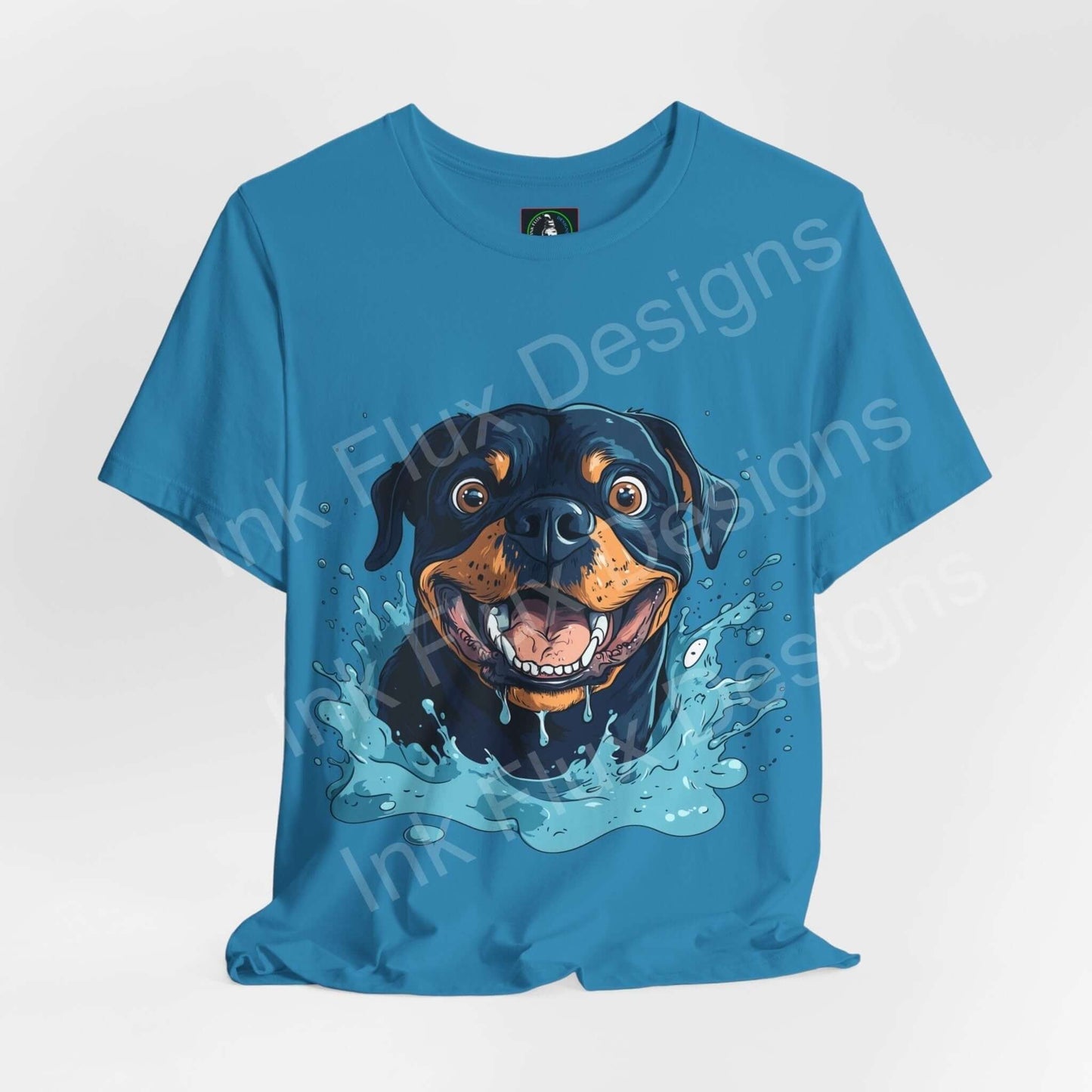 Blue unisex jersey T-shirt featuring a vibrant graphic of a smiling Rottweiler emerging from water, perfect for dog lovers and casual wear.