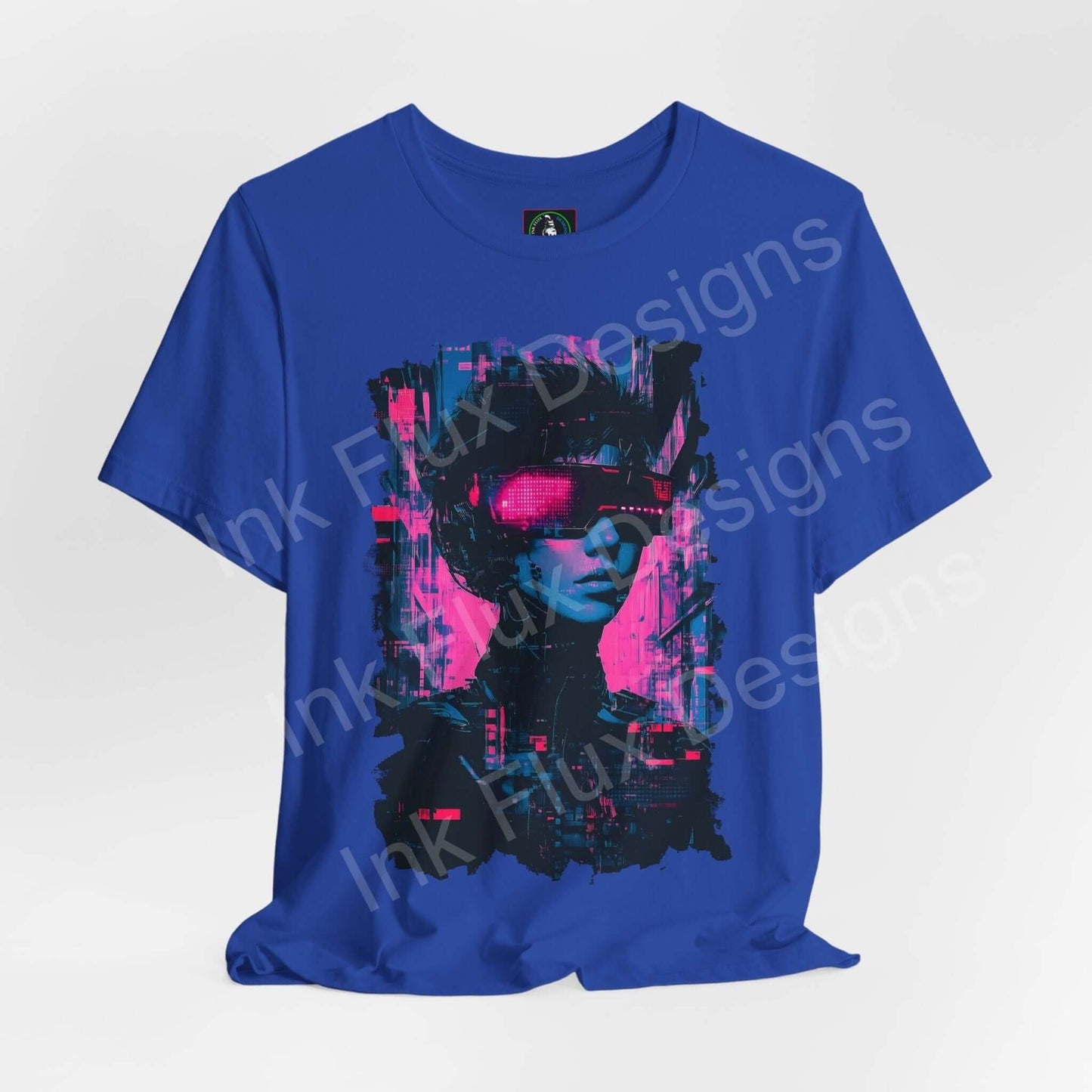 Cyberpunk graphic tee featuring a vivid blue unisex T-shirt with a stylized robotic face design in pink and black, from Bella+Canvas.