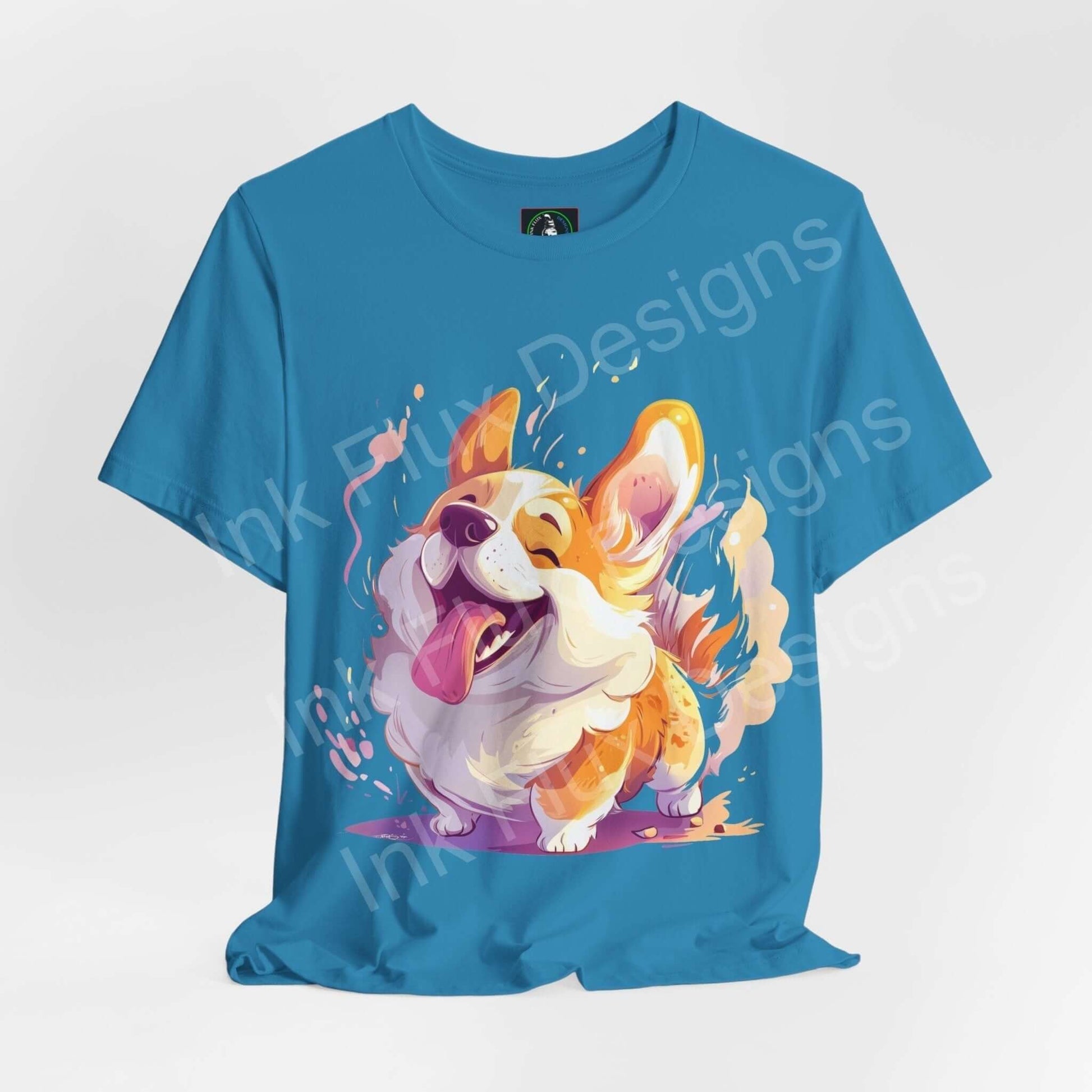 Vibrant blue unisex T-shirt featuring a joyful corgi graphic, crafted from soft Airlume cotton, perfect for dog lovers and casual wear.