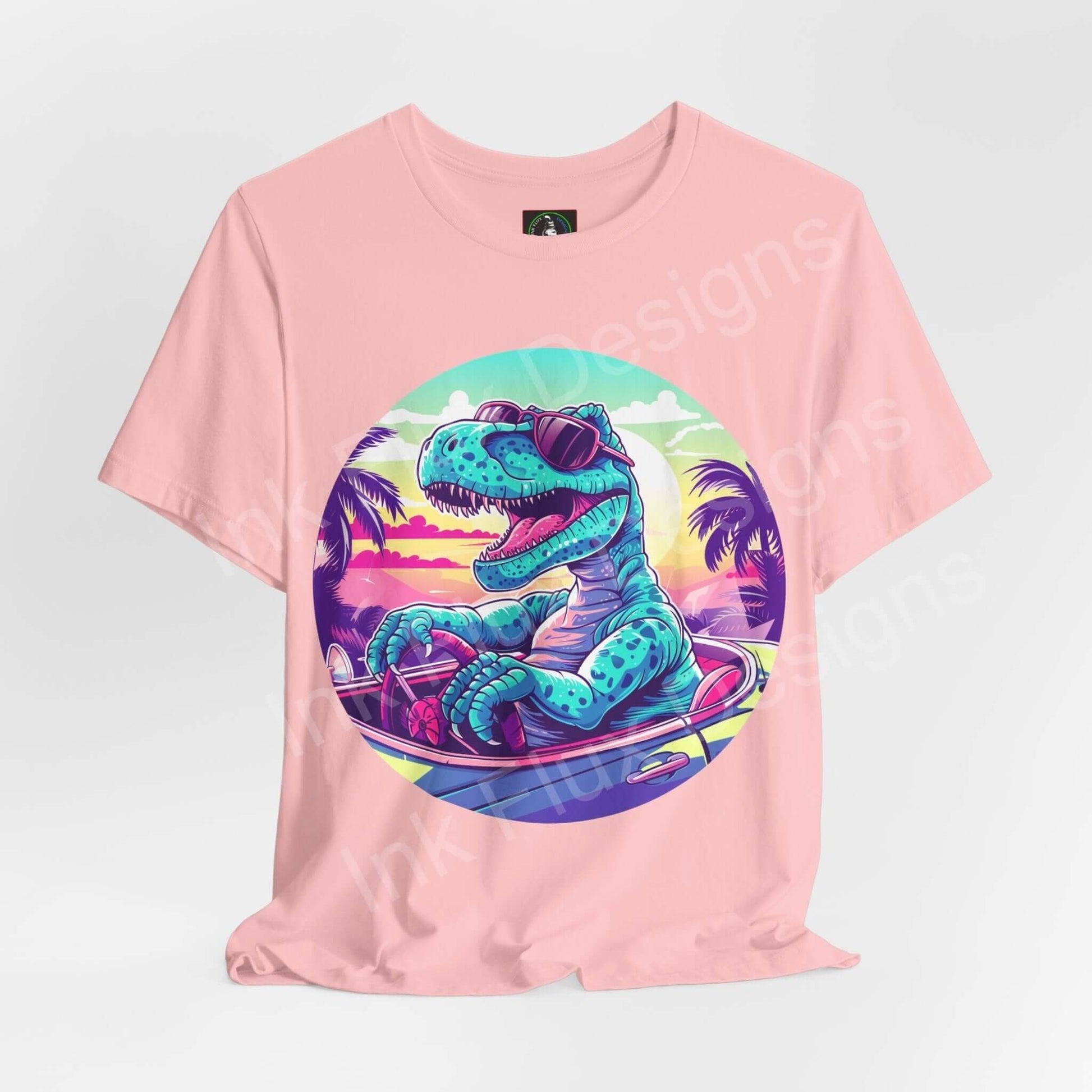 Pink unisex T-shirt with bold graphic of a dinosaur surfing, from the Cruising Dinosaur collection, ideal for comfort and style.