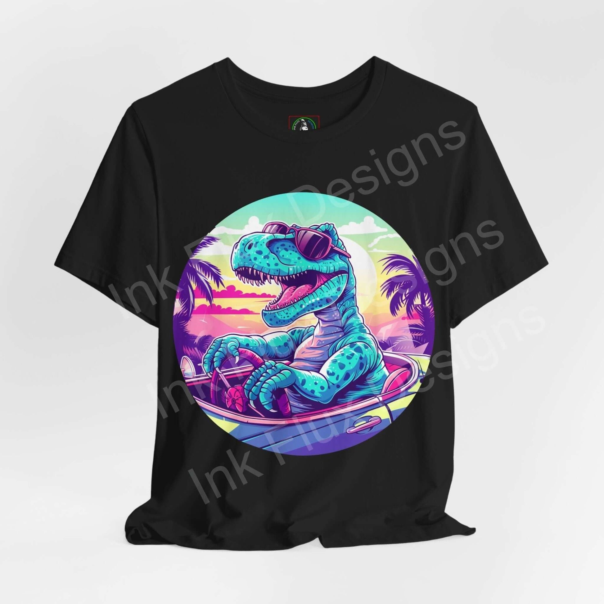 Bold graphic tee featuring a vibrant Cruising Dinosaur design on a black unisex jersey T-shirt, with tropical sunset and palm trees.