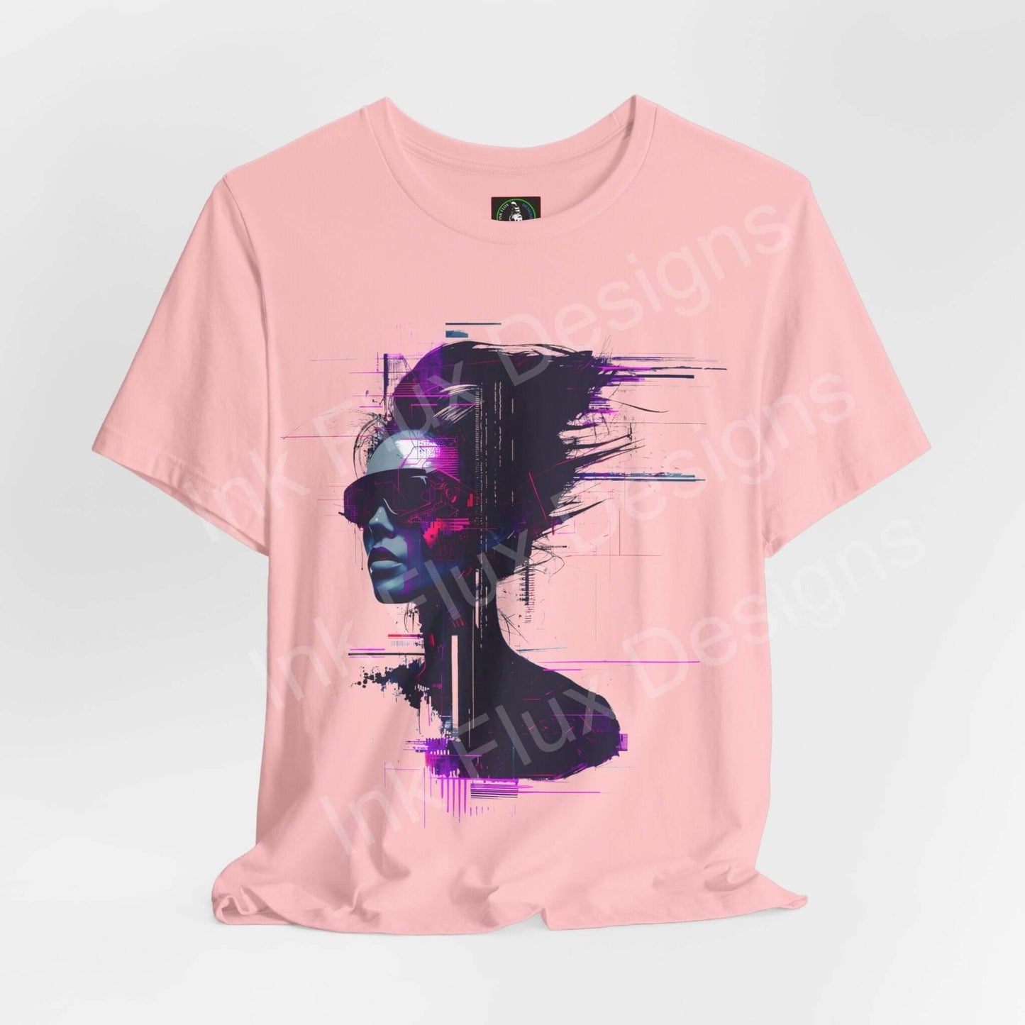 Pink unisex T-shirt featuring a cyberpunk graphic of a cyborg woman's face in vibrant purple and black, from Bella+Canvas's ethically made collection.