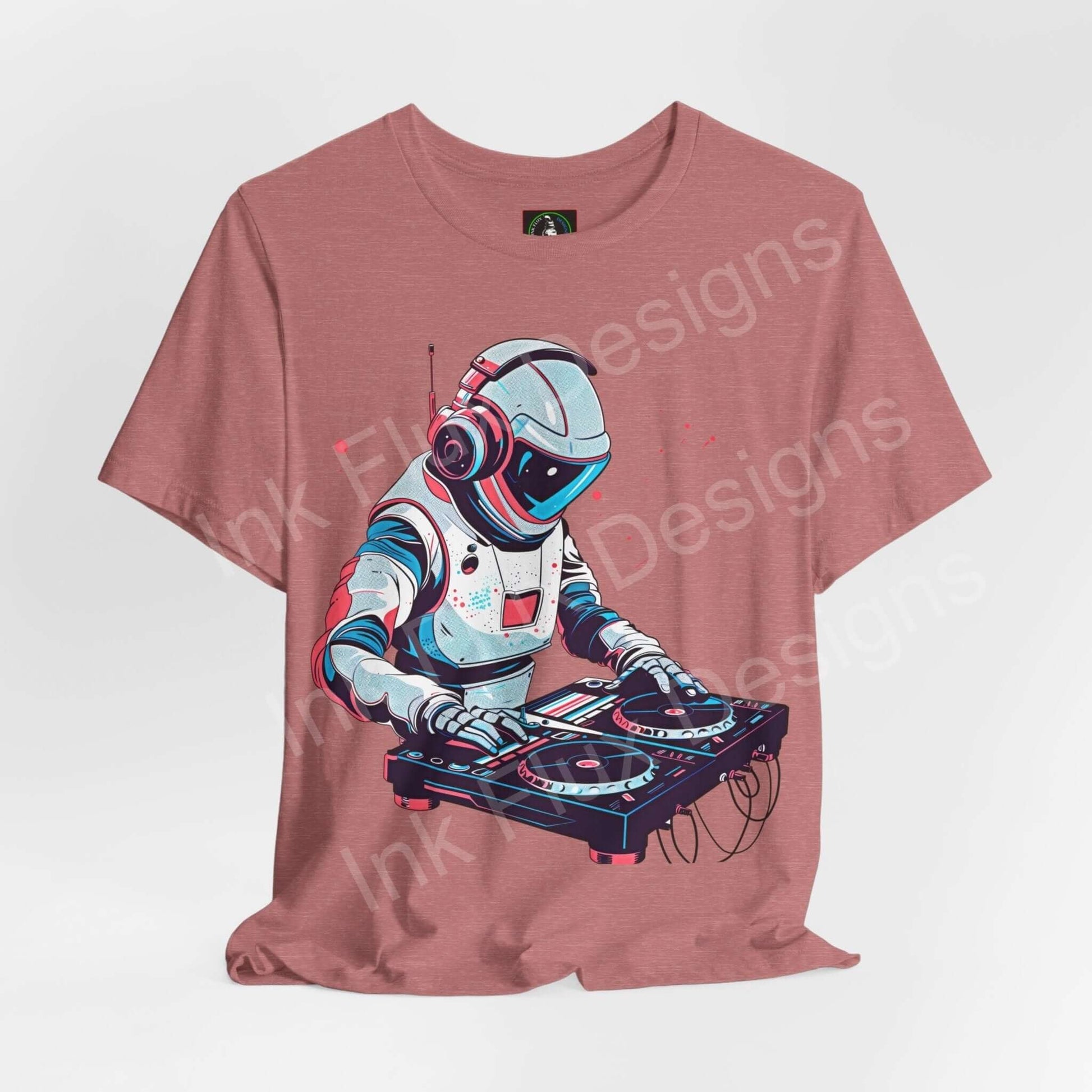 Unisex rose-colored graphic tee featuring a bold design of an astronaut DJing, crafted from soft Airlume cotton, perfect for style and comfort.