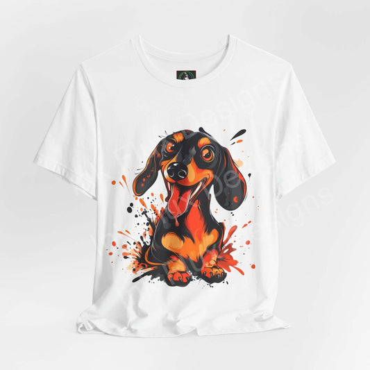 Graphic tee featuring a vibrant Dachshund design on a white unisex T-shirt, showcasing splashes of orange and black ink.