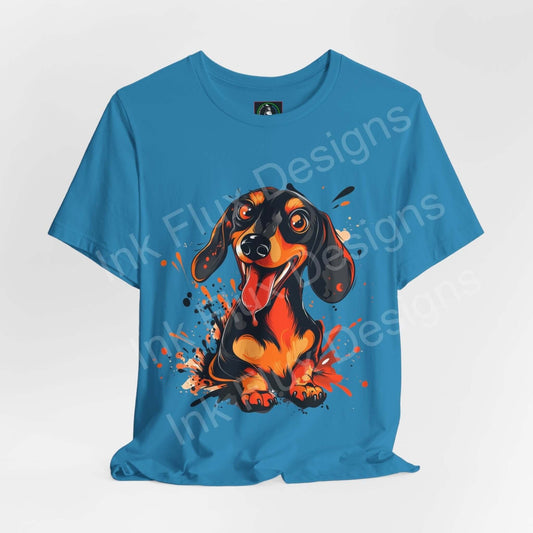 Blue unisex graphic tee featuring a vibrant Dachshund dog design, crafted from breathable Airlume cotton, ideal for dog lovers and casual wear.