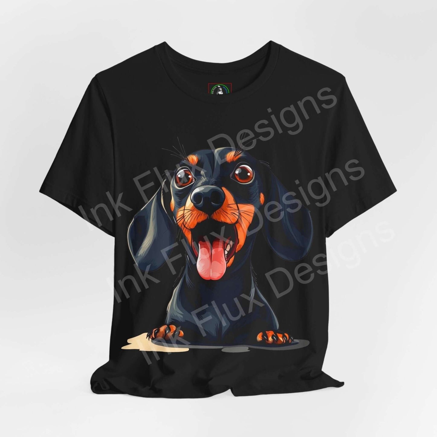 Black unisex T-shirt featuring a vibrant graphic of a Dachshund, crafted from soft Airlume cotton, ideal for dog lovers and casual wear.