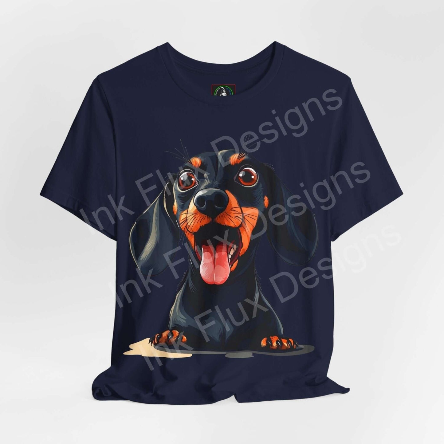 Navy blue graphic tee featuring a whimsical Dachshund design, ideal for dog lovers and casual wear, by Bella+Canvas.