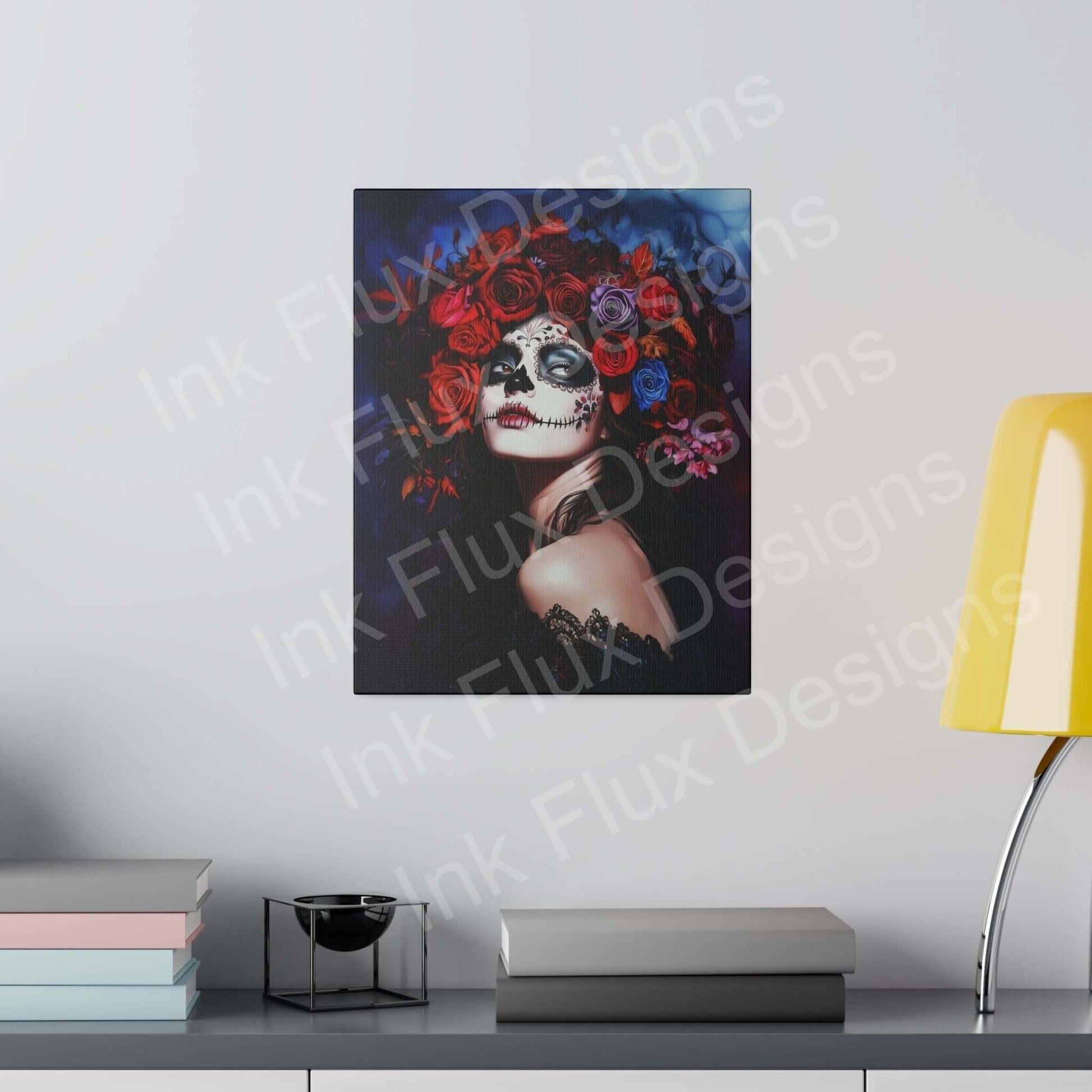 Day of the Dead woman's portrait on matte canvas with bold designs, displayed above a modern gray console table.