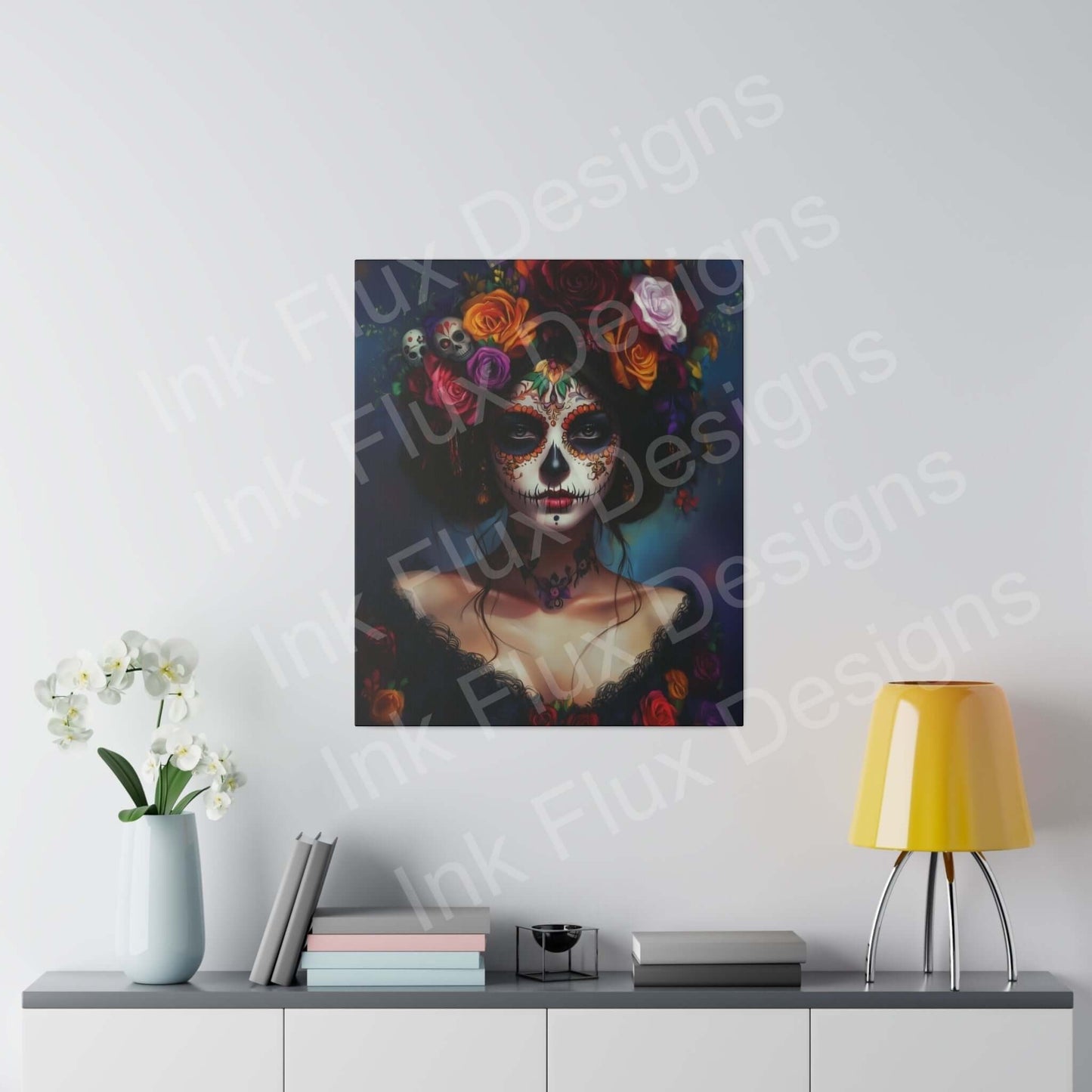 Day of the Dead woman's portrait canvas with bold designs hung above a modern desk, complemented by a yellow lamp and white orchids.