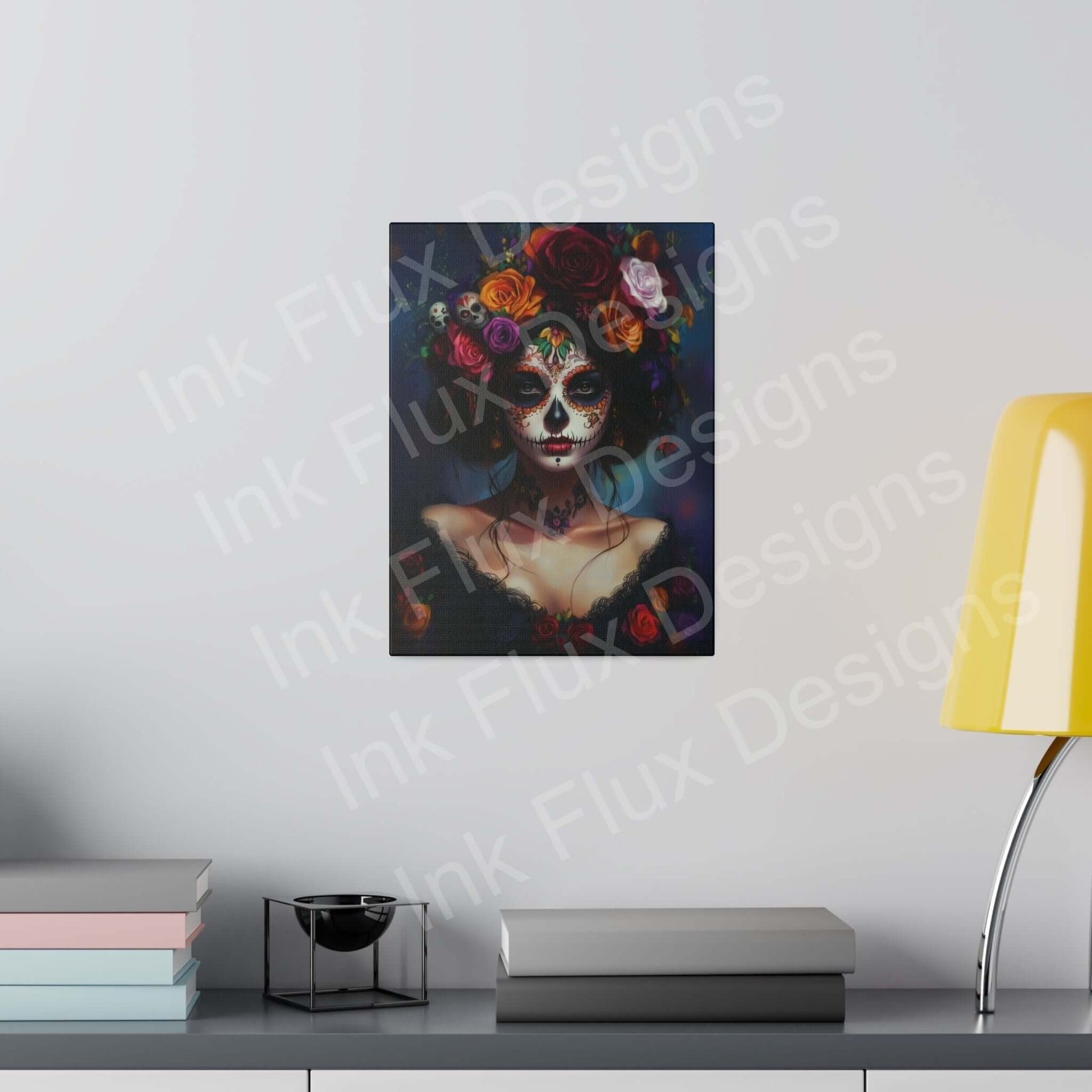 Canvas print of a woman in Day of the Dead makeup with bold designs, hung in a modern room setting.