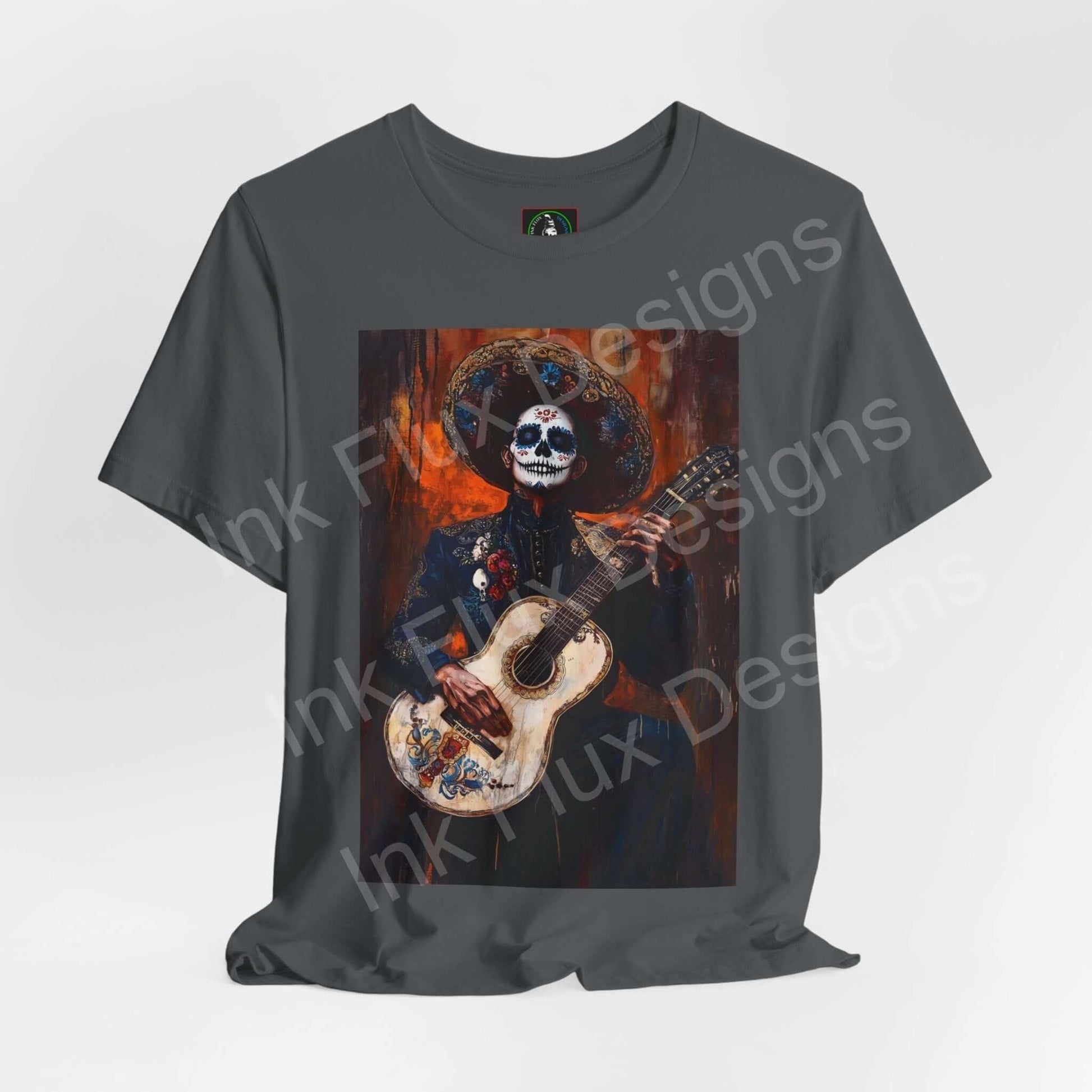 Day of the Dead Charro Man graphic tee featuring a skeleton in traditional Mexican attire playing guitar, ideal for DÃa de Muertos celebrations.