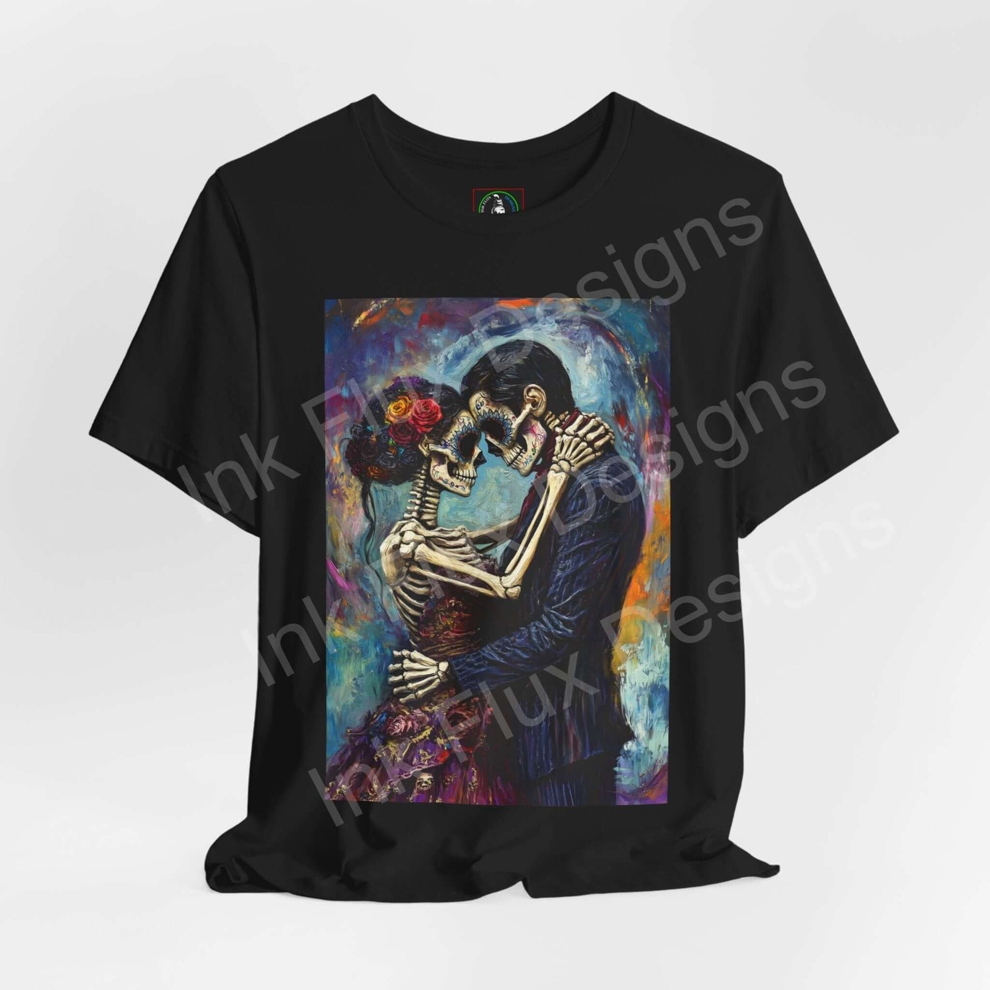 Day of the Dead-themed graphic tee featuring a colorful painting of a skeleton couple embracing, on a black unisex T-shirt.