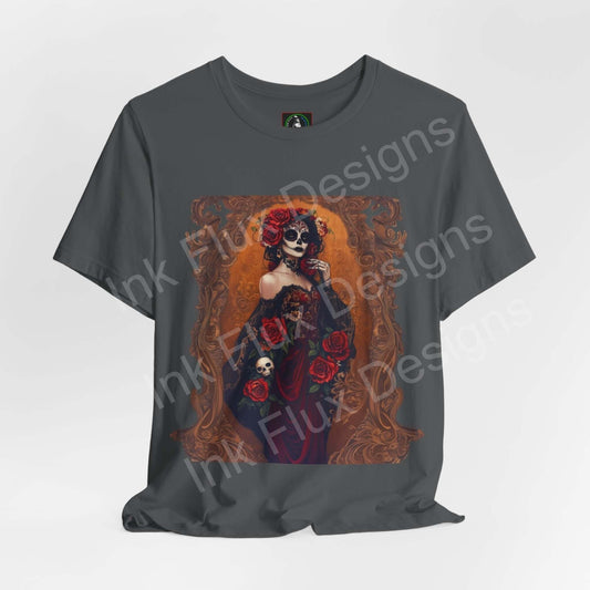 Day of the Dead themed graphic tee featuring a vivid design of a woman adorned with skull makeup and roses, on a dark gray T-shirt