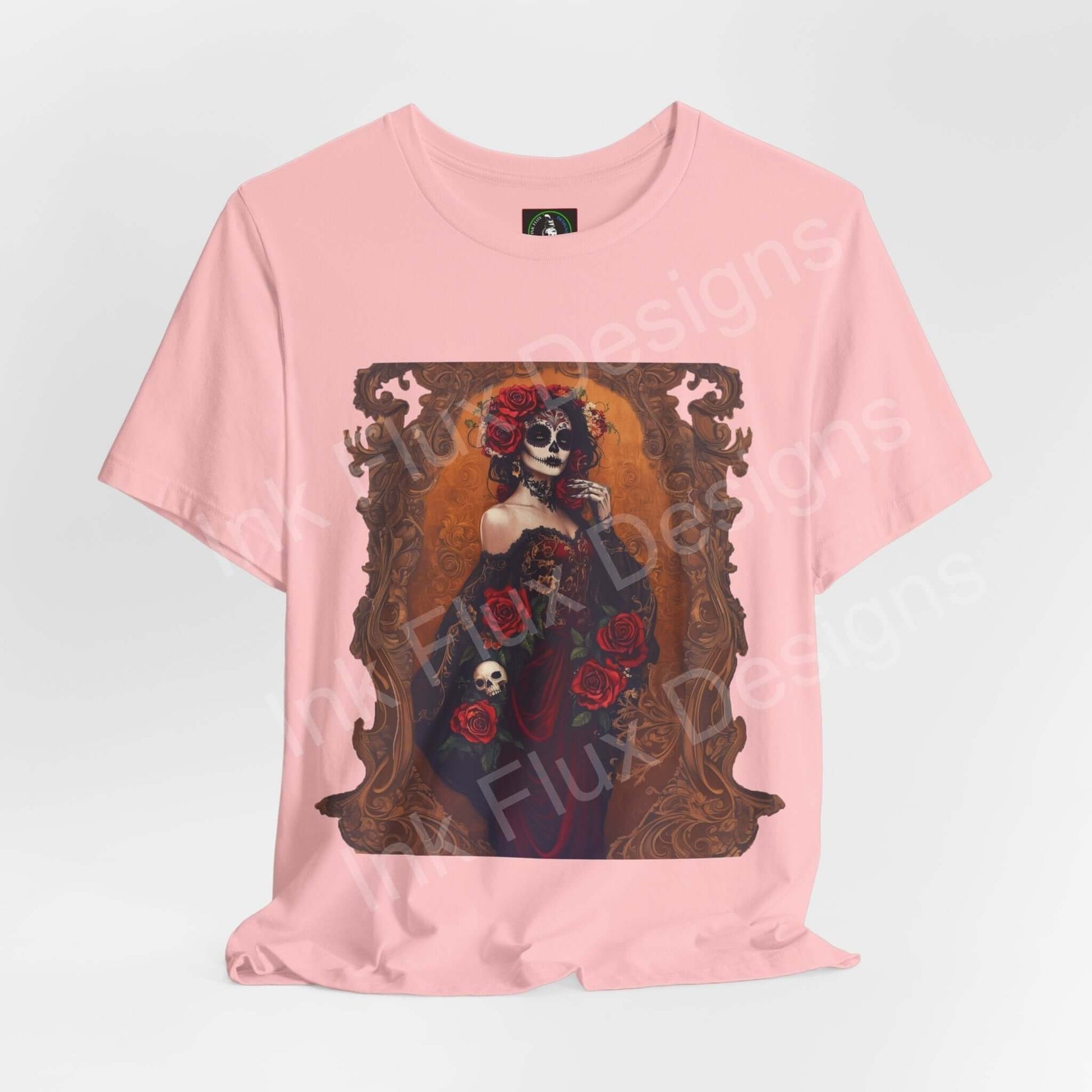 Pink Day of the Dead T-shirt featuring a graphic of a skeleton dressed with roses, available in unisex sizes