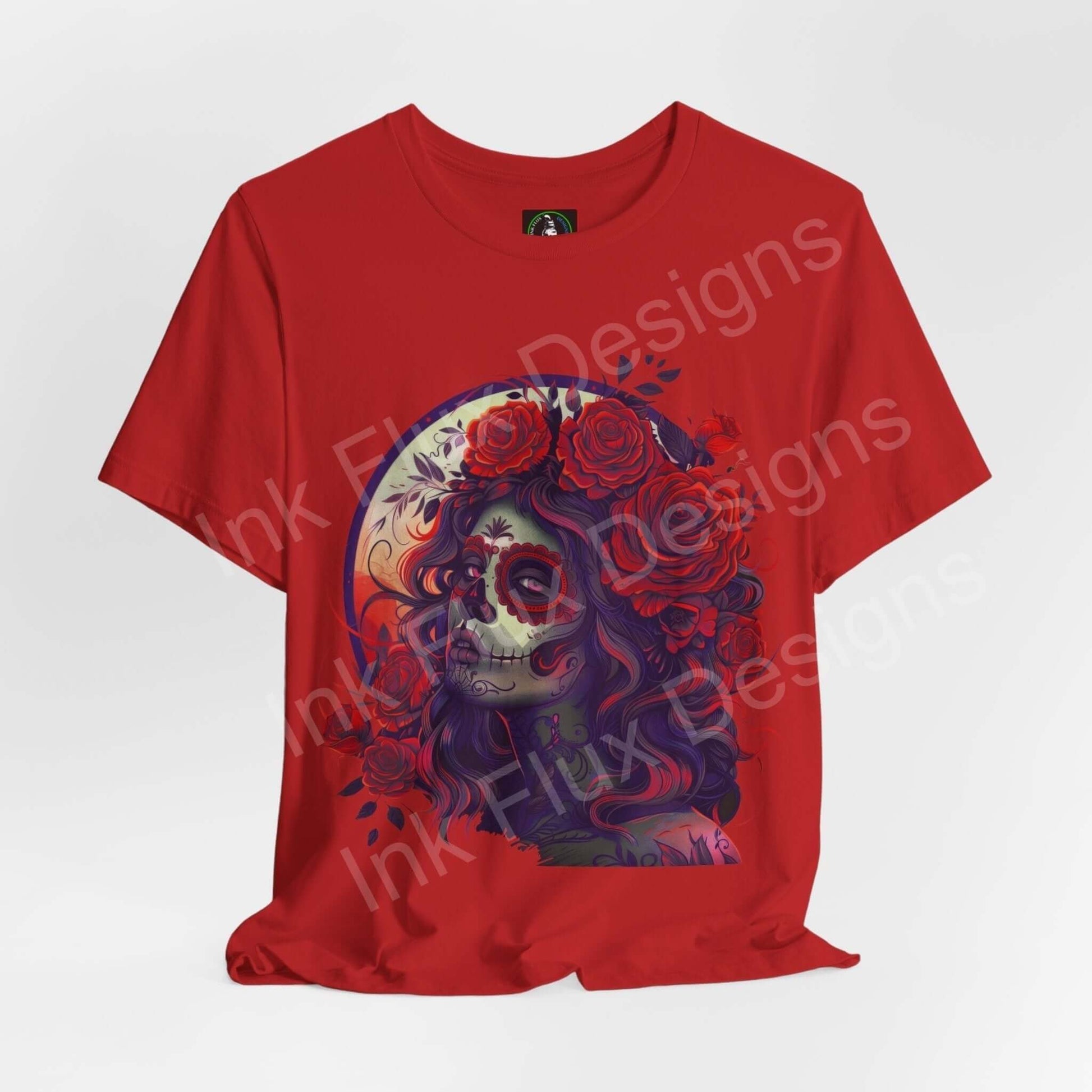 Red Day of the Dead graphic tee featuring a colorful DÃa de Muertos skull design surrounded by roses, unisex fit by Bella+Canvas.