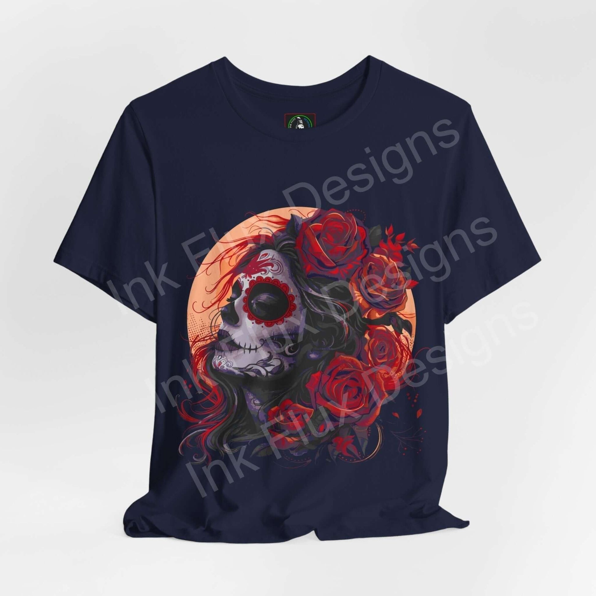 Day of the Dead themed graphic tee featuring a skull and roses design on a dark blue unisex T-shirt, perfect for DÃa de Muertos celebrations