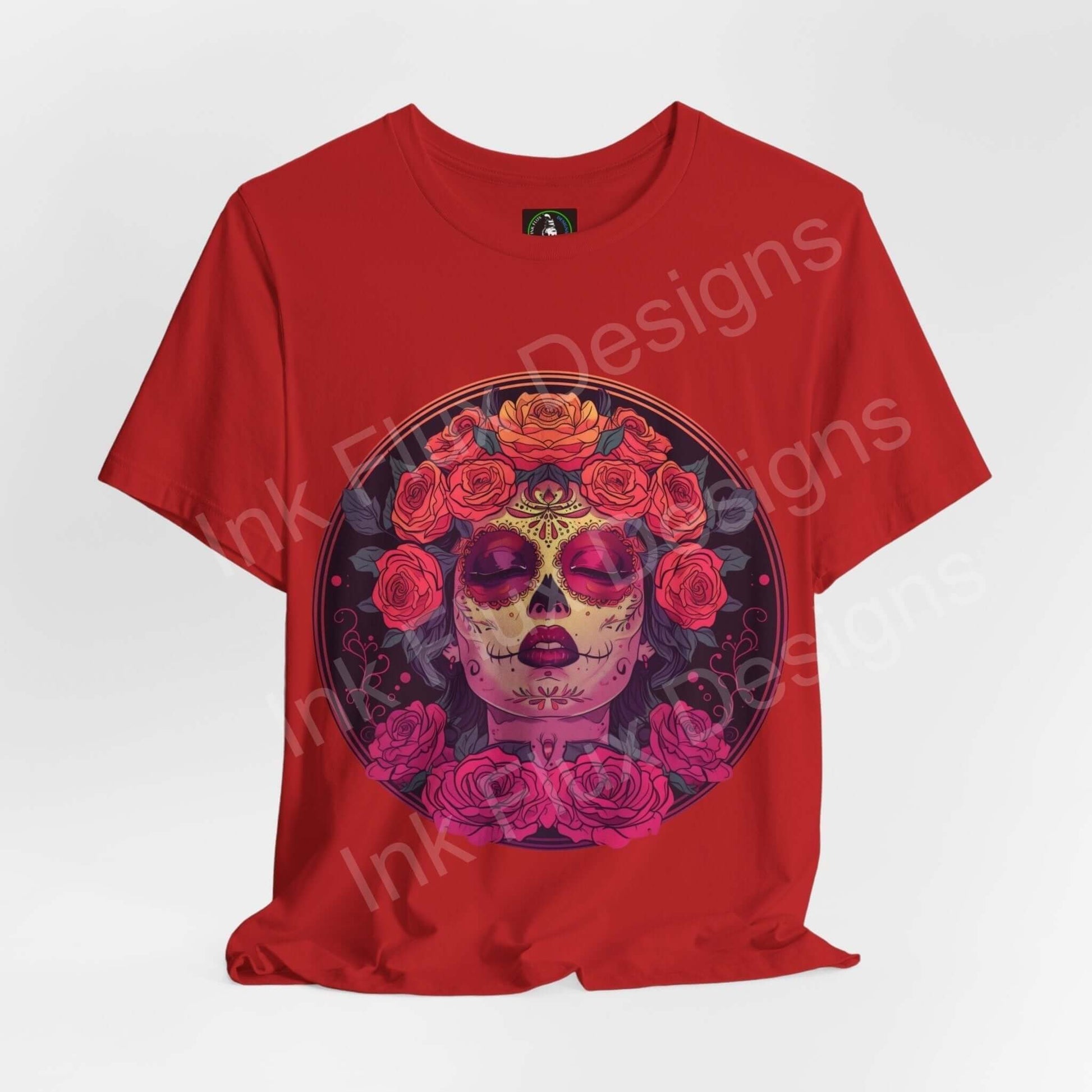 Red Day of the Dead themed T-shirt featuring a vibrant DÃa de Muertos skull and floral graphic design, ideal for cultural celebrations.