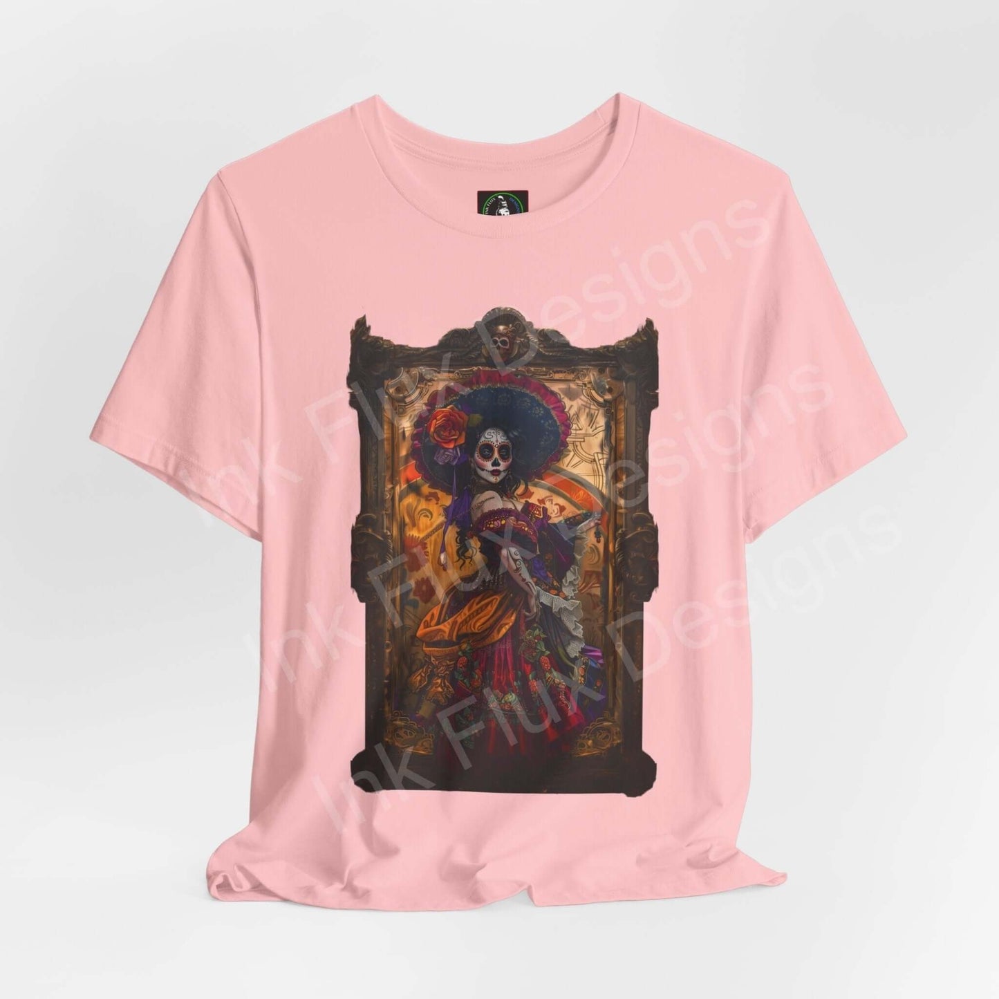 Pink "Day of the Dead IX" unisex T-shirt featuring a vivid DÃa de Muertos graphic print, crafted by Bella+Canvas for style and comfort.