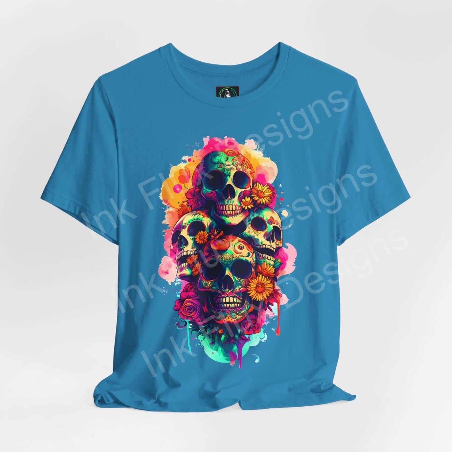 Vibrant Day of the Dead graphic tee featuring a colorful skull design on a teal T-shirt, perfect for DÃa de Muertos celebrations.