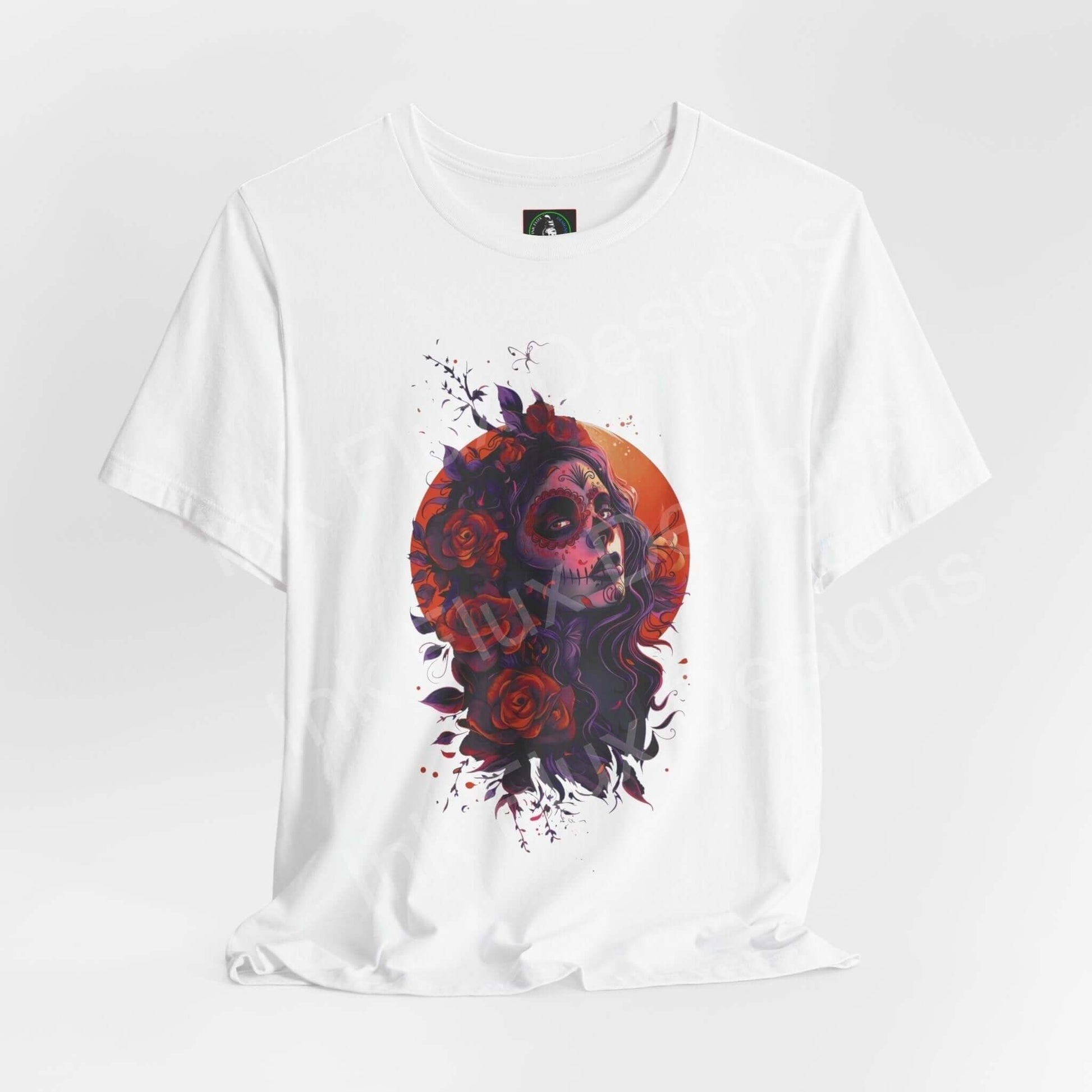 Day of the Dead themed graphic tee featuring a colorful skull and roses design on a white unisex T-shirt from Bella+Canvas.