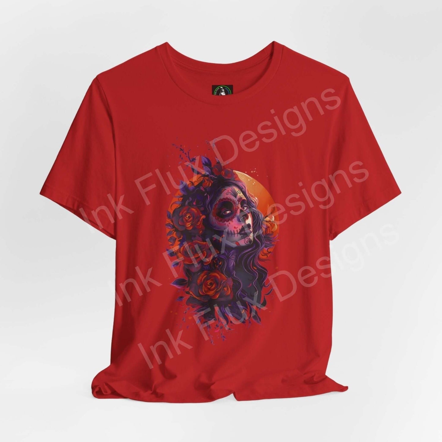 Day of the Dead themed red T-shirt featuring a vibrant DÃa de Muertos skull and floral graphic, ideal for celebrating the cultural festival.