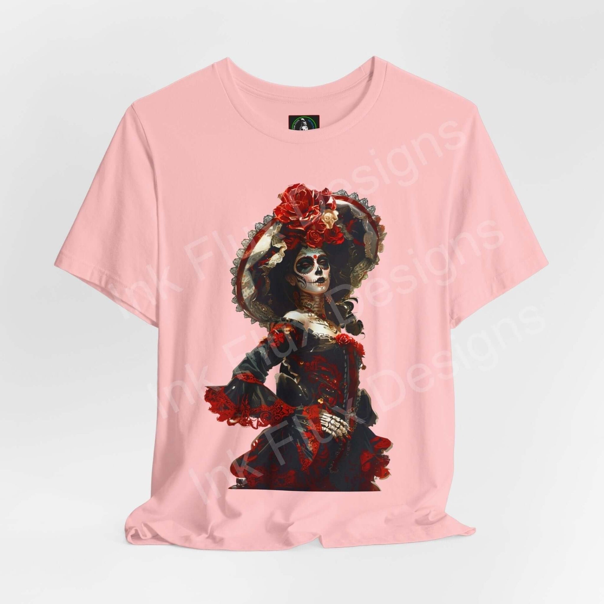 Pink Day of the Dead graphic tee featuring a detailed DÃa de Muertos skull design, ideal for stylish, ethically-made T-shirts.