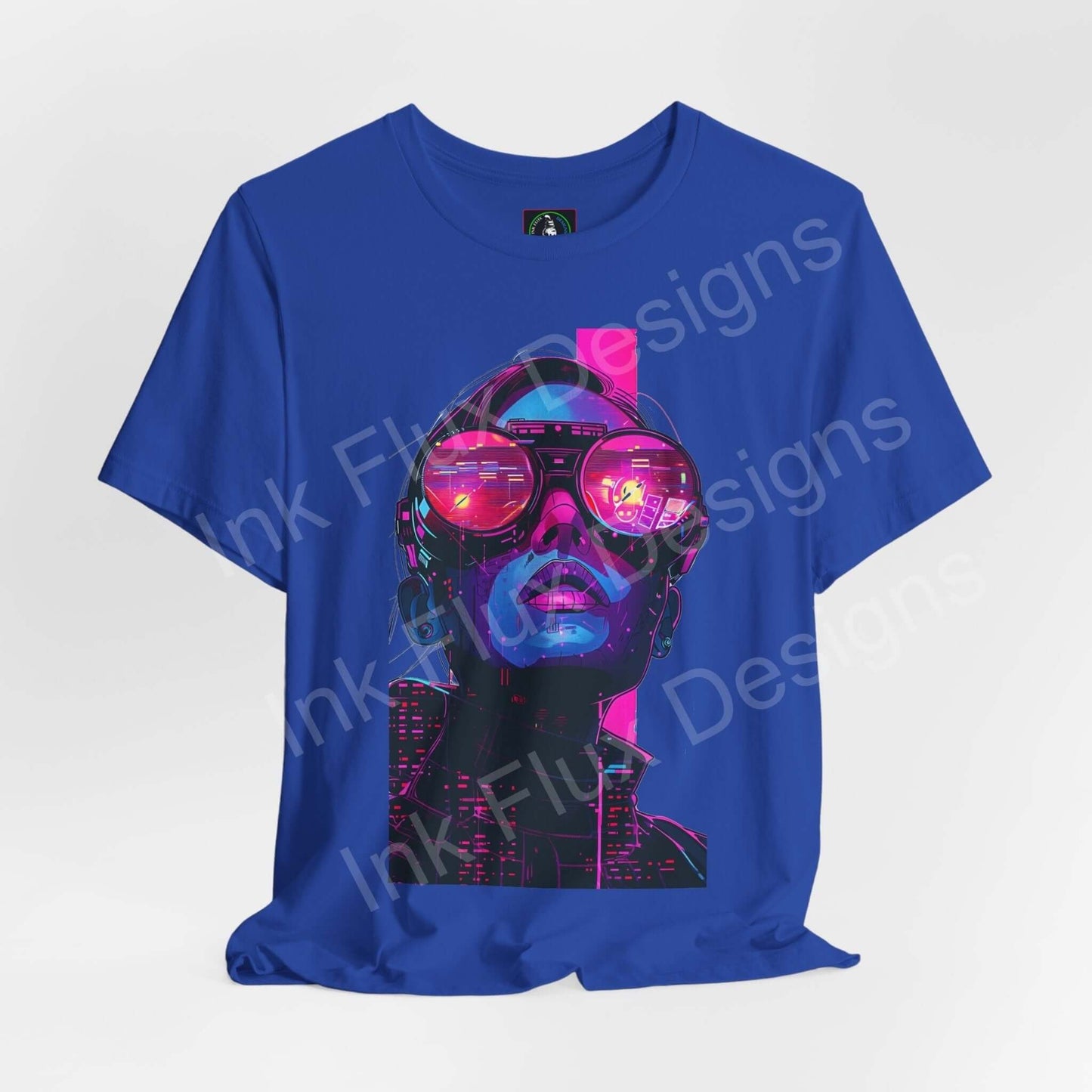 Cyberpunk-inspired graphic tee in blue, featuring a vibrant neon face design, from Bella+Canvas' ethical and sustainable range.
