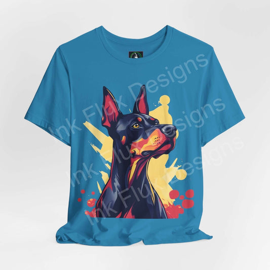 Stylish graphic tee featuring a vibrant Dobermann portrait on a blue unisex shirt, perfect for dog lovers and casual wear.